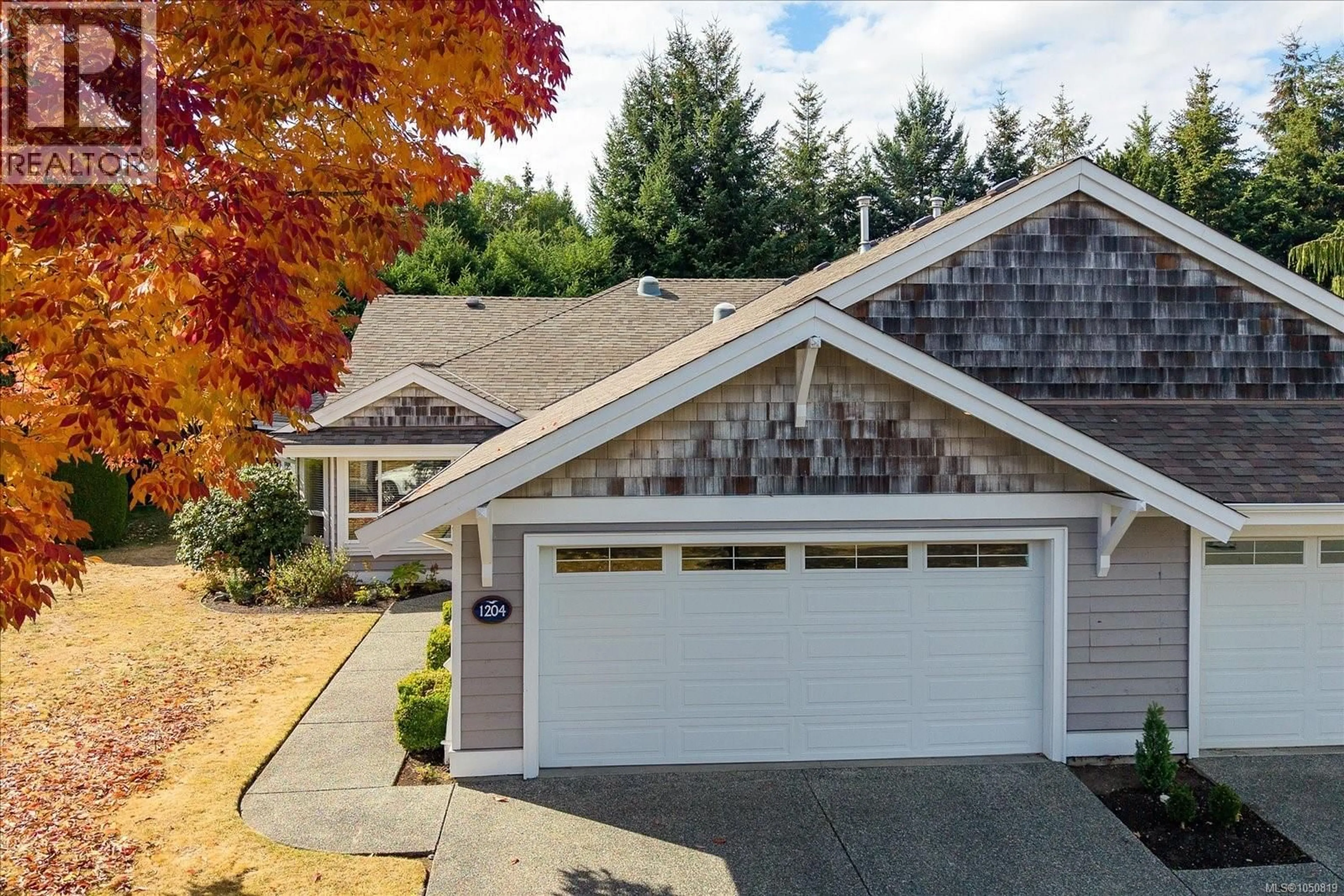 Home with vinyl exterior material, street for 1204 GABRIOLA DRIVE, Parksville British Columbia V9P2X5