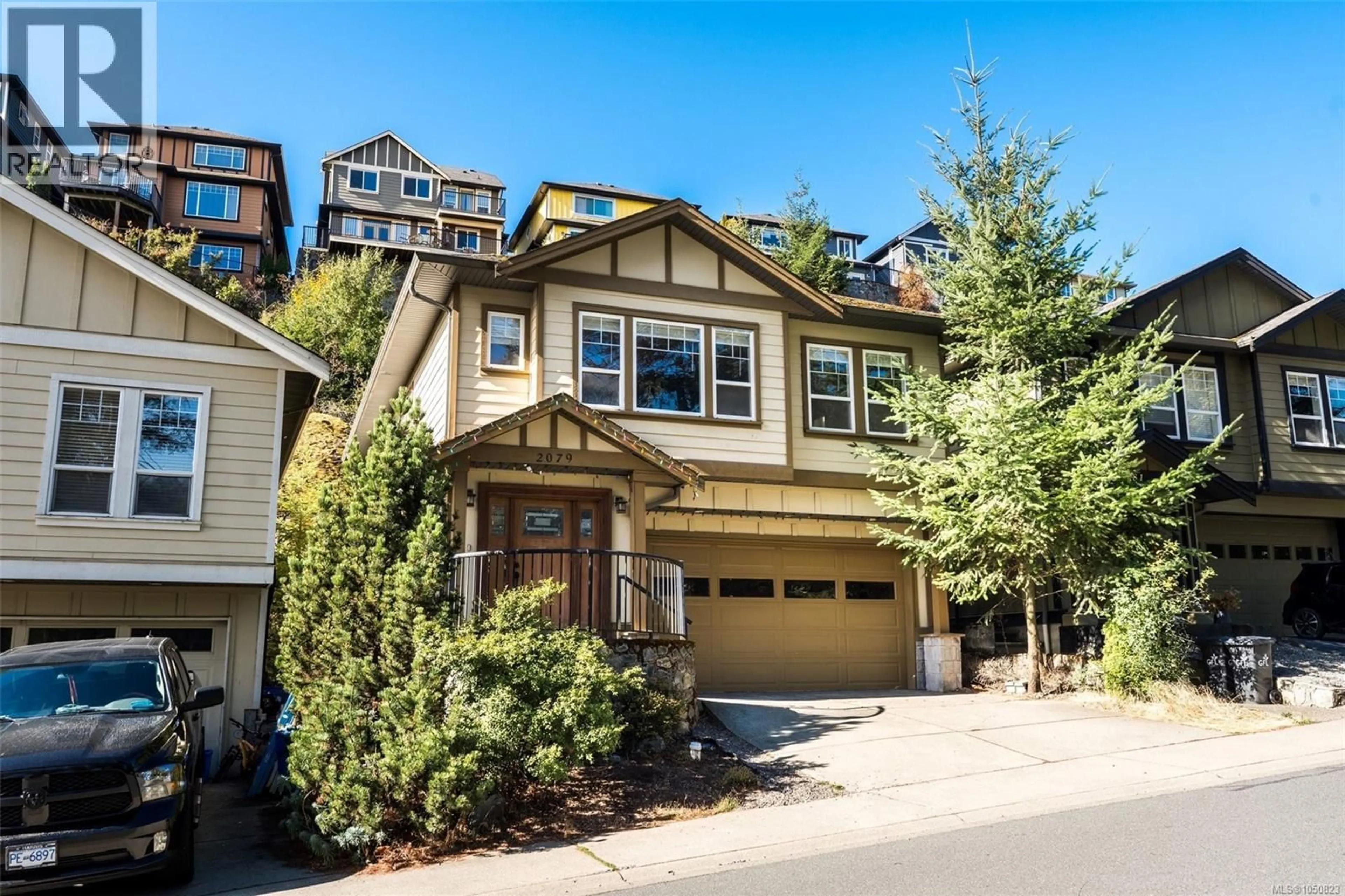 Home with vinyl exterior material, street for 2079 LONGSPUR DRIVE, Langford British Columbia V9B6W3