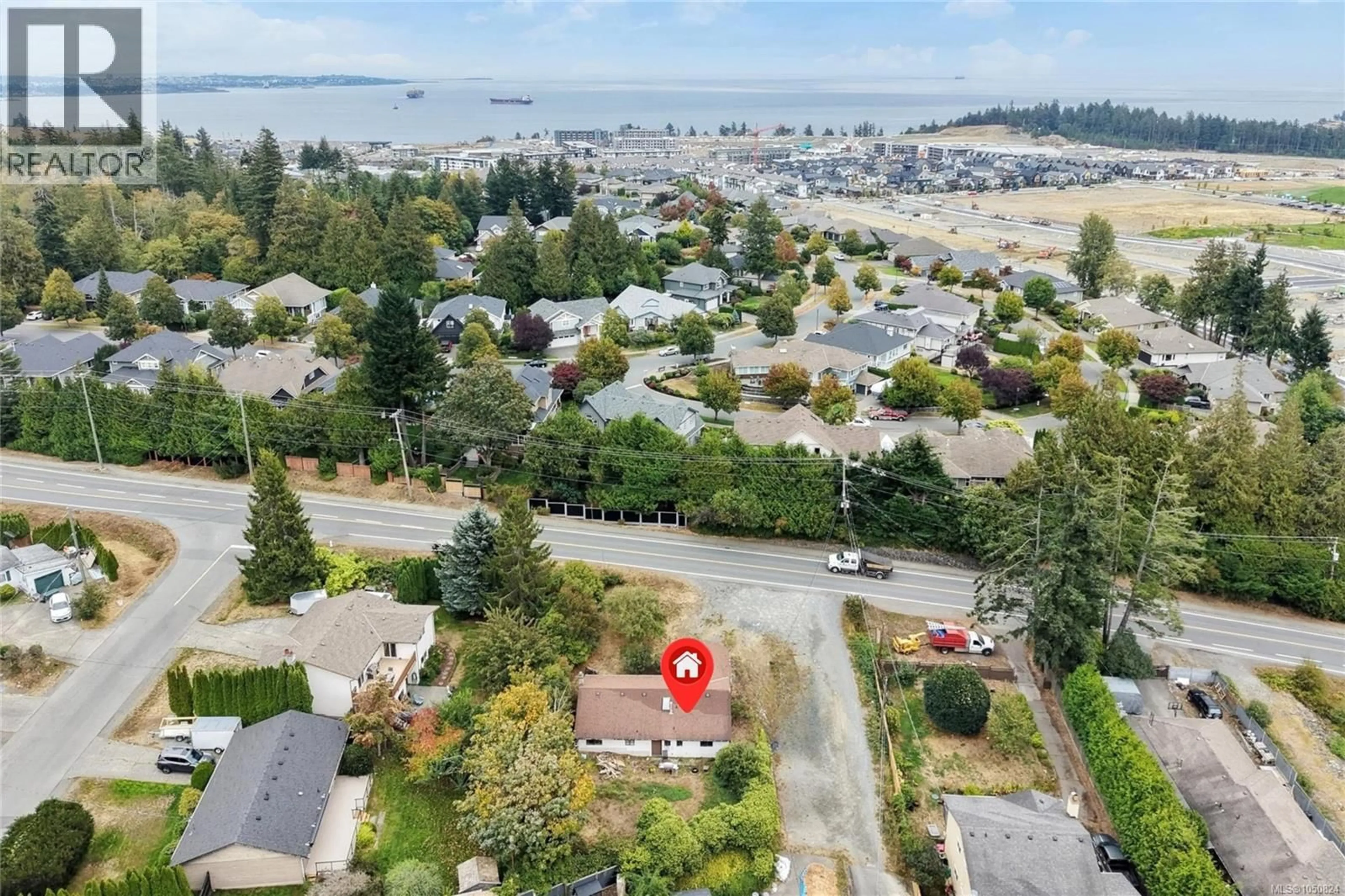 A pic from outside/outdoor area/front of a property/back of a property/a pic from drone, water/lake/river/ocean view for 3572 WISHART ROAD, Colwood British Columbia V9C3B4