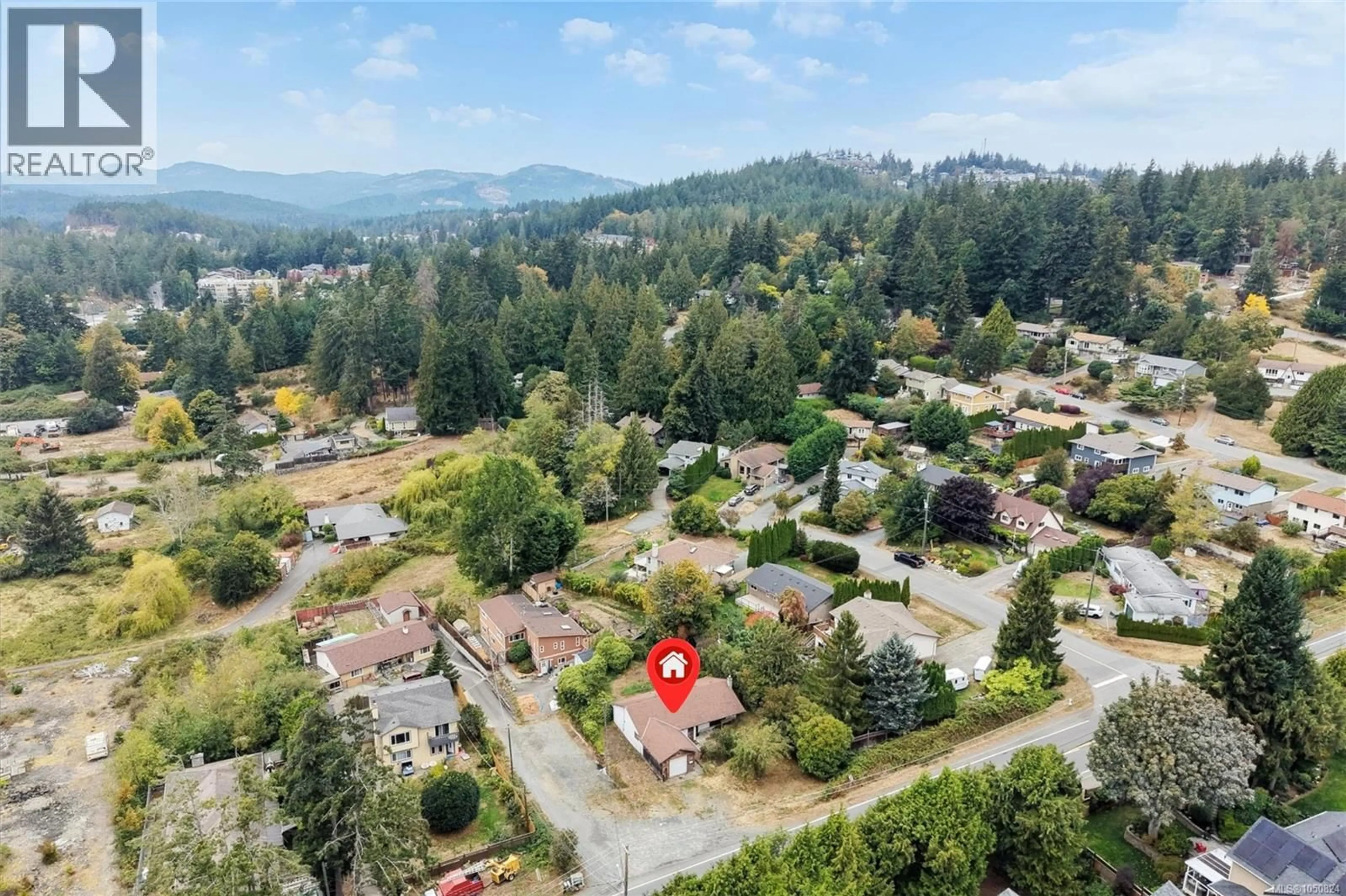 A pic from outside/outdoor area/front of a property/back of a property/a pic from drone, mountain view for 3572 WISHART ROAD, Colwood British Columbia V9C3B4