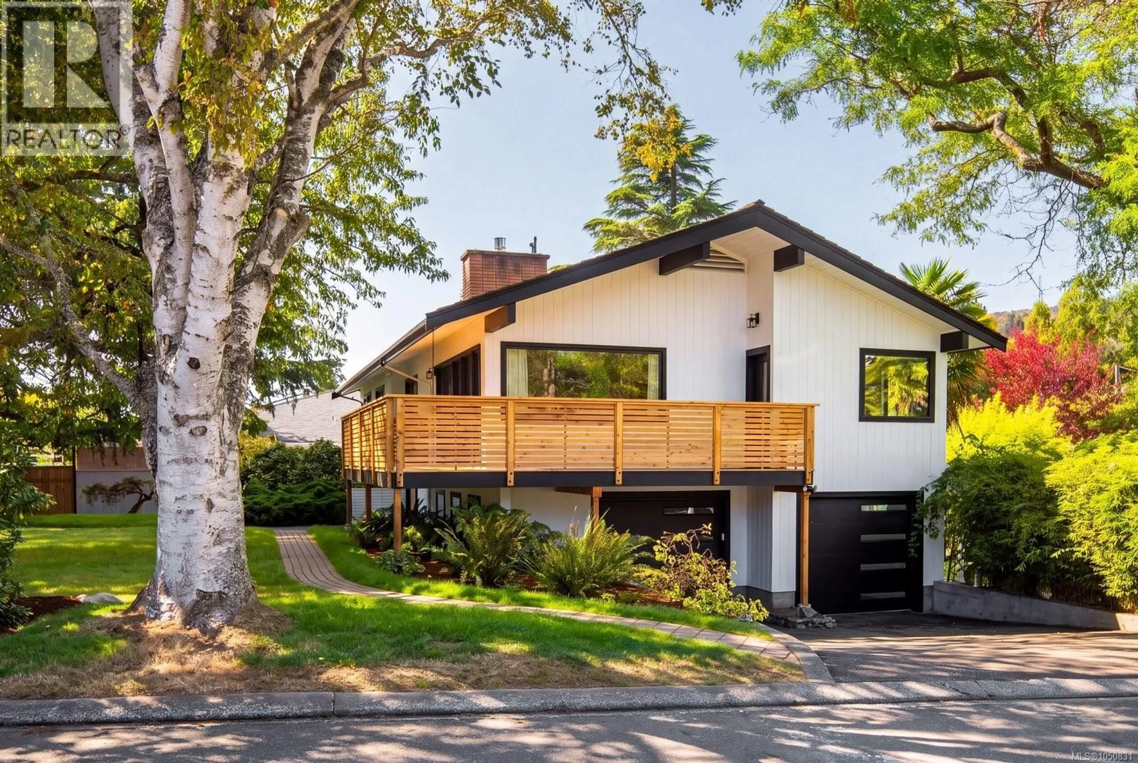 Home with brick exterior material, street for 1601 MILEVA LANE, Saanich British Columbia V8N2V6