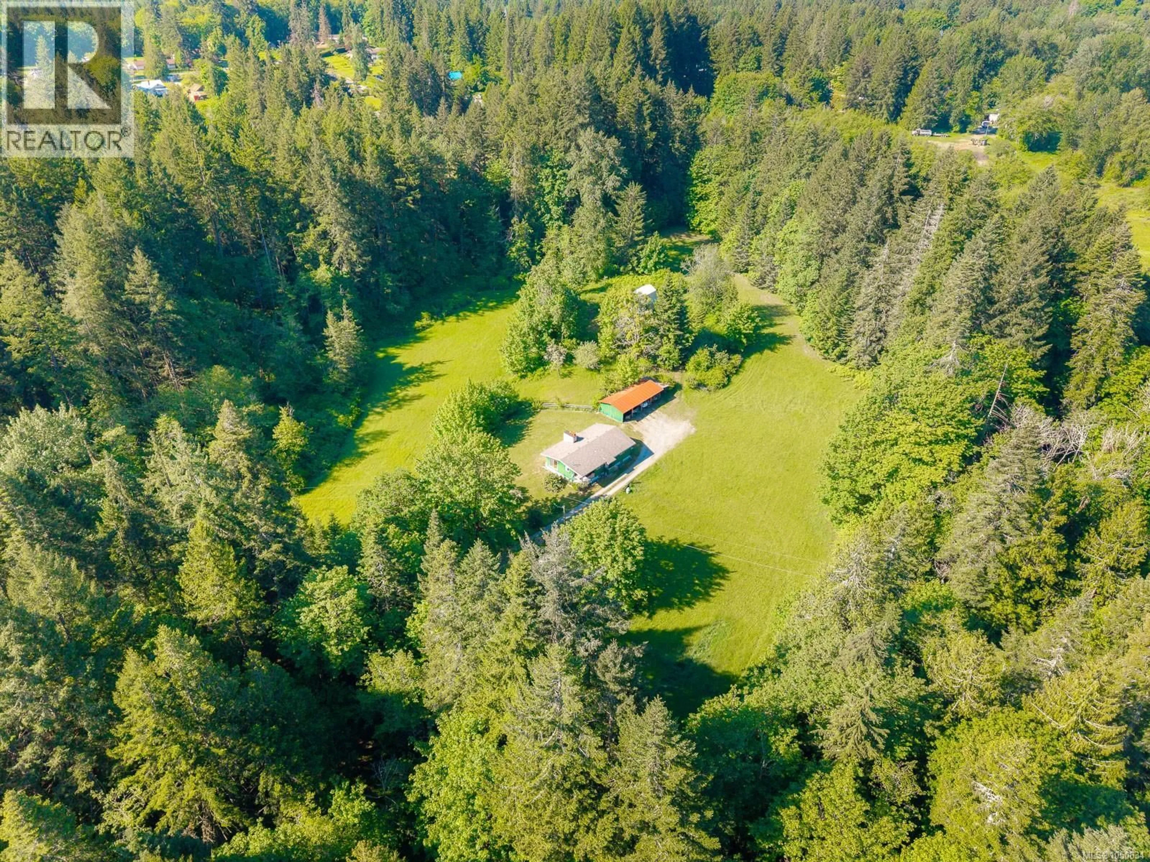 A pic from outside/outdoor area/front of a property/back of a property/a pic from drone, forest/trees view for 3541 CASEY ROAD, Duncan British Columbia V9L1N9