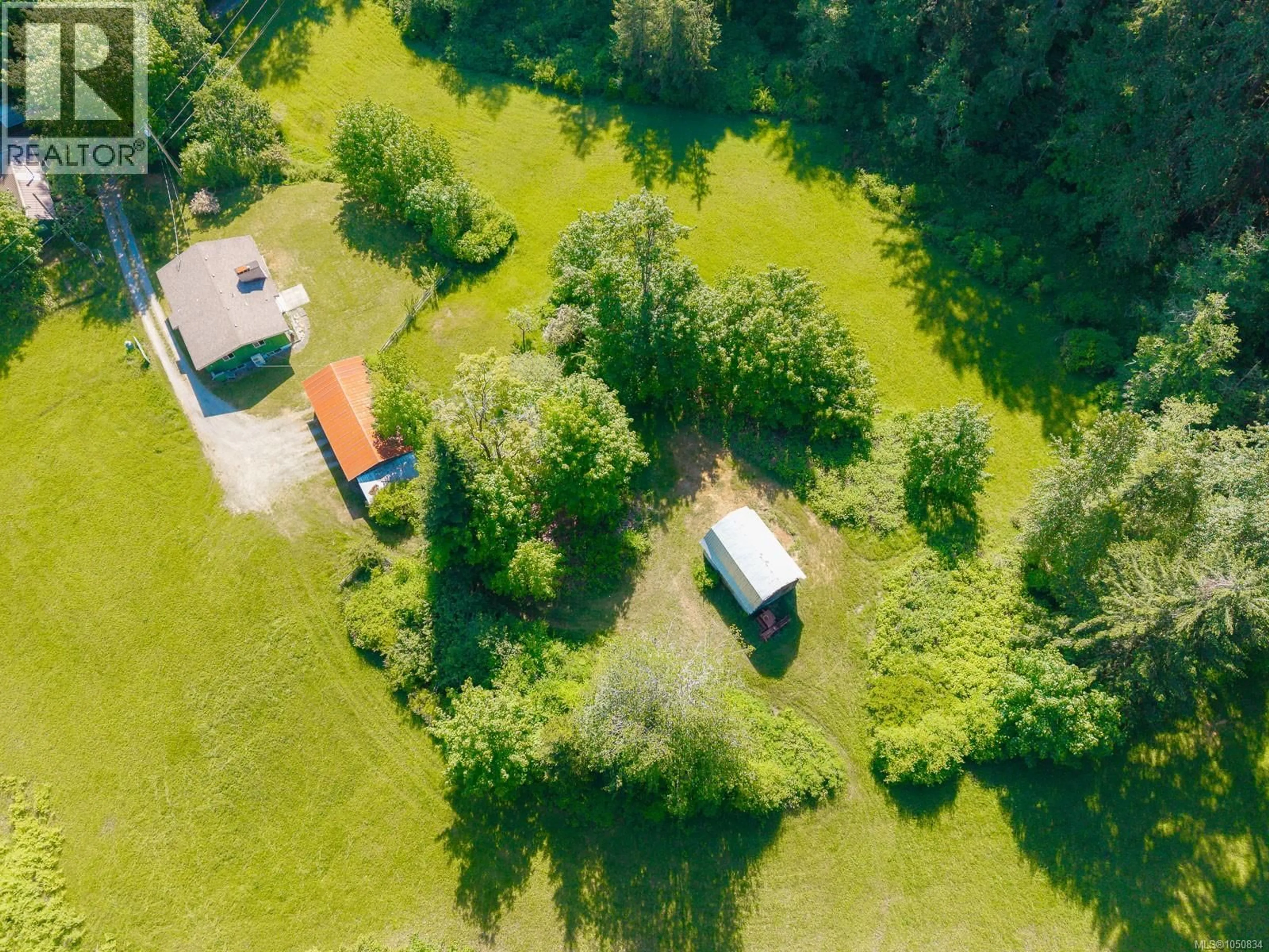A pic from outside/outdoor area/front of a property/back of a property/a pic from drone, forest/trees view for 3541 CASEY ROAD, Duncan British Columbia V9L1N9