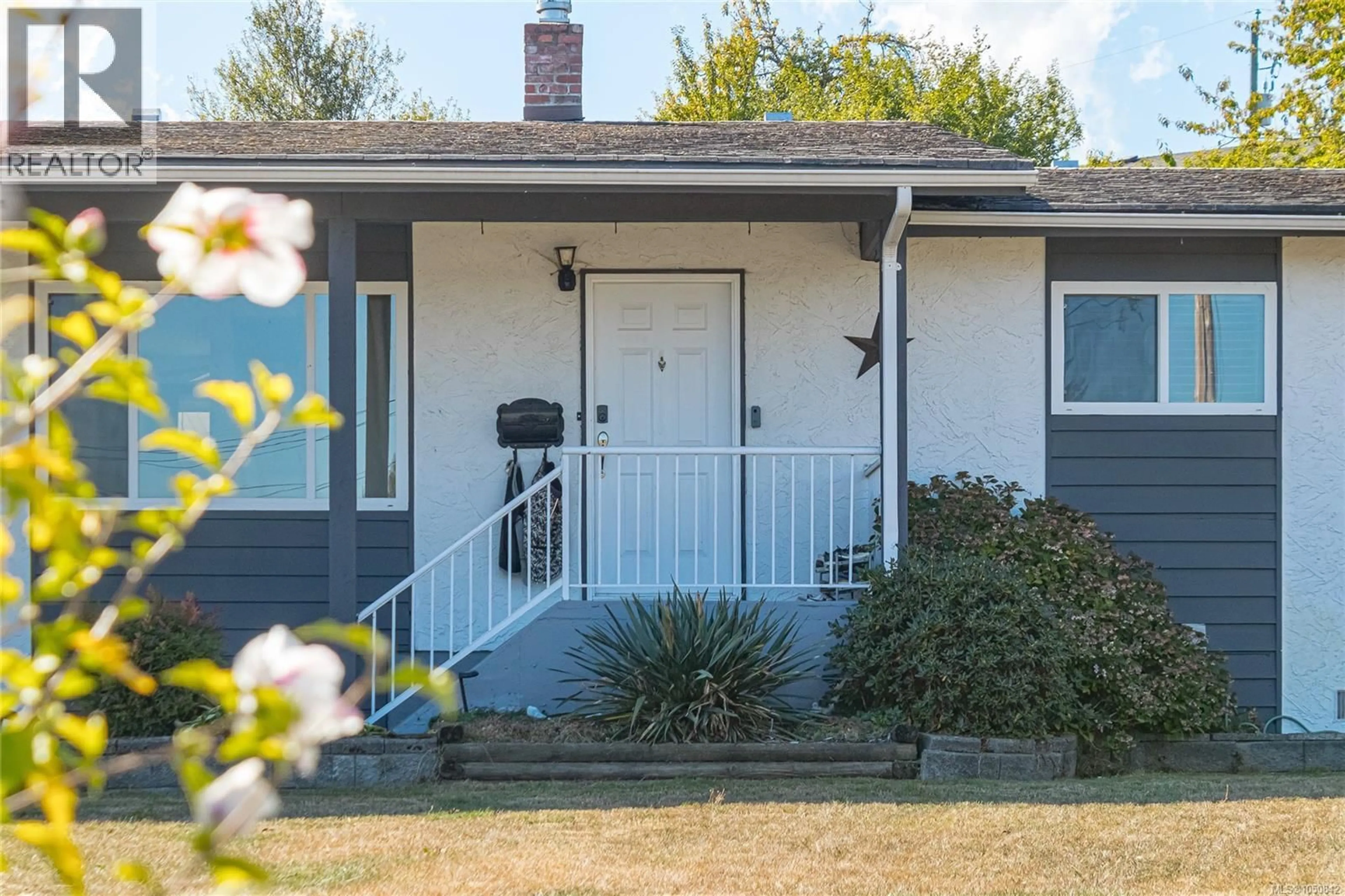 Home with vinyl exterior material, street for 3140 HIGHFIELD ROAD, Duncan British Columbia V9L4A5