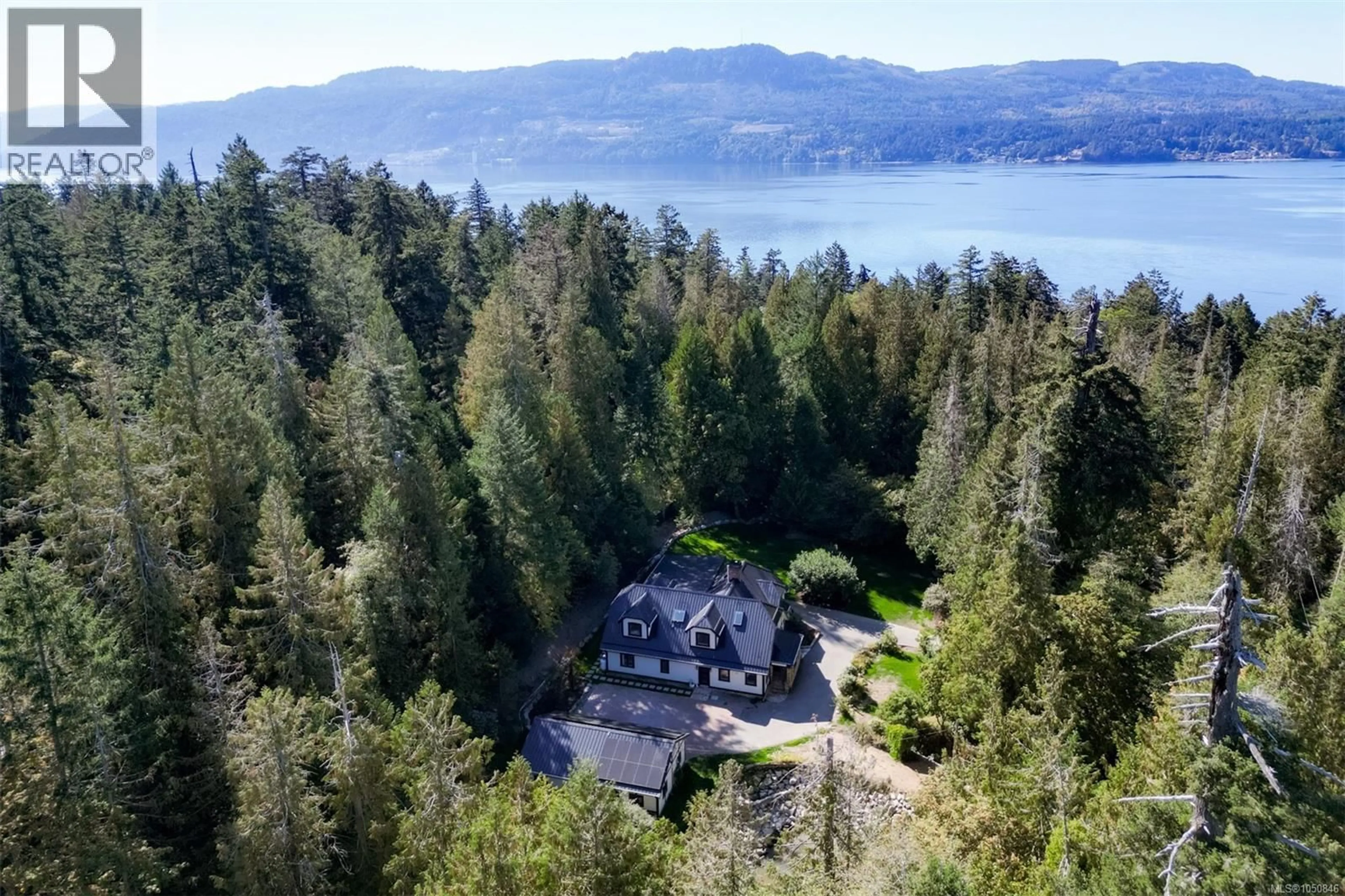A pic from outside/outdoor area/front of a property/back of a property/a pic from drone, water/lake/river/ocean view for 8401 LAWRENCE ROAD, Central Saanich British Columbia V8M1S5