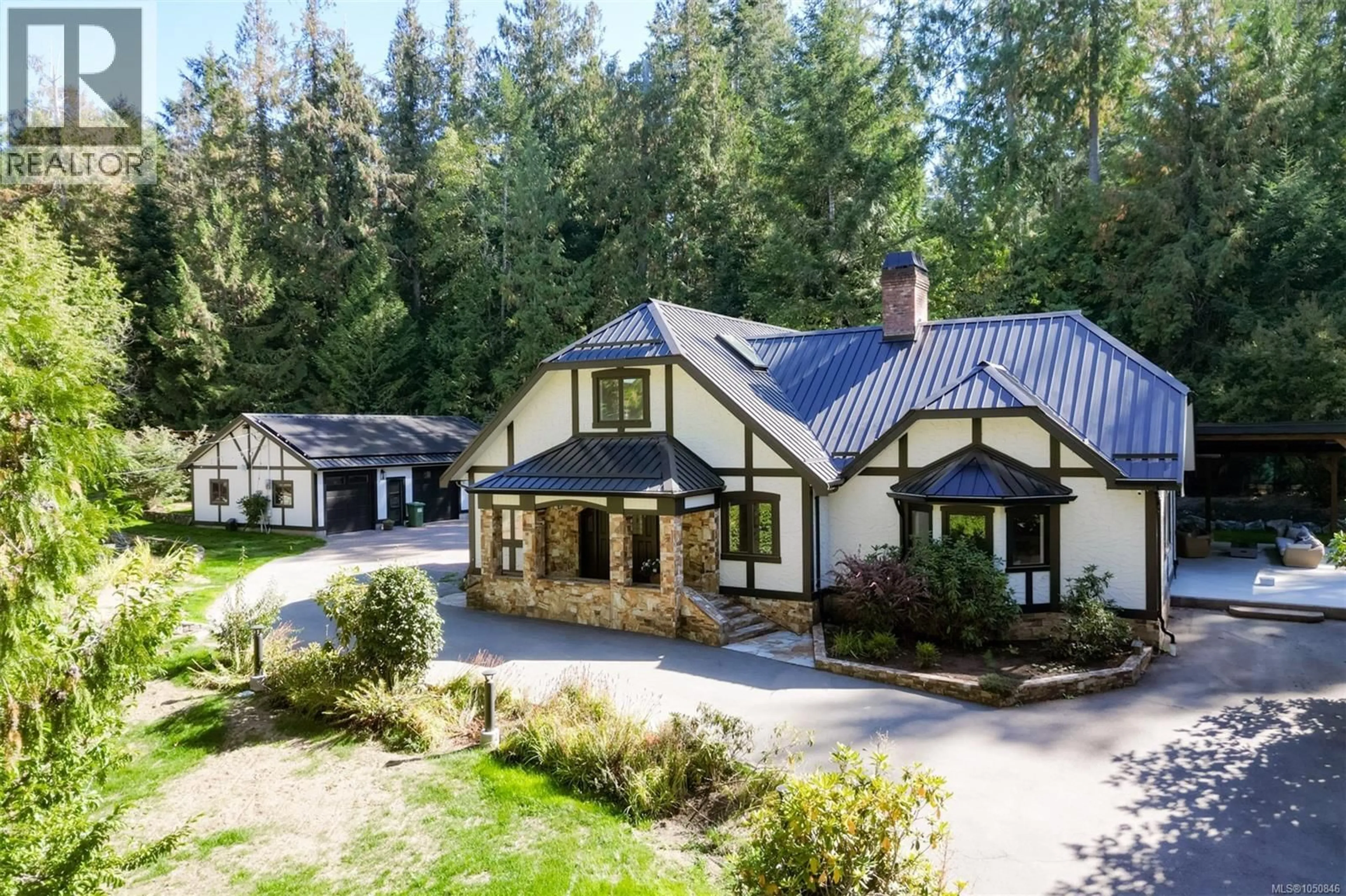 A pic from outside/outdoor area/front of a property/back of a property/a pic from drone, unknown for 8401 LAWRENCE ROAD, Central Saanich British Columbia V8M1S5