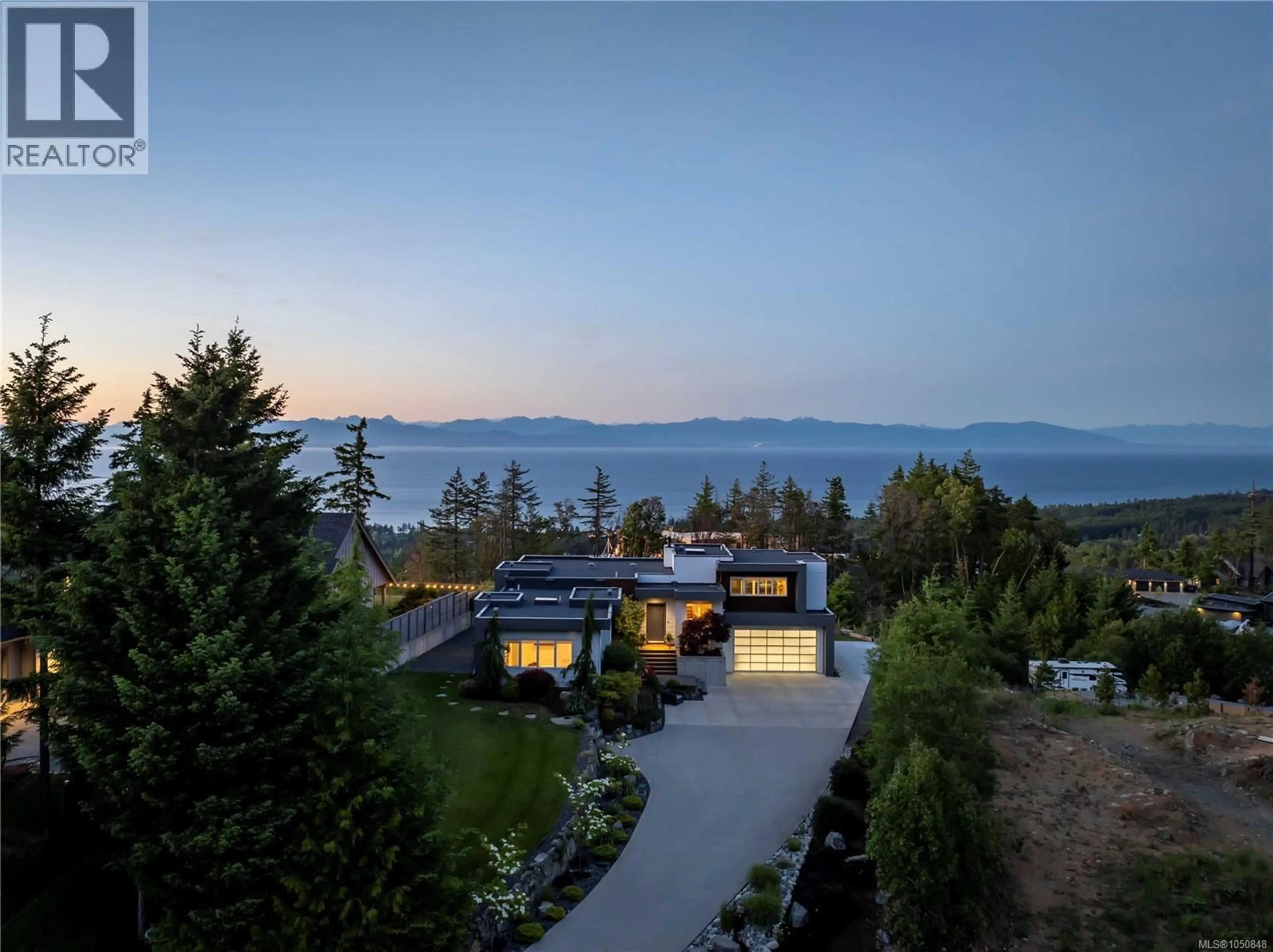 A pic from outside/outdoor area/front of a property/back of a property/a pic from drone, mountain view for 7482 COPLEY RIDGE DRIVE, Lantzville British Columbia V0R2H0