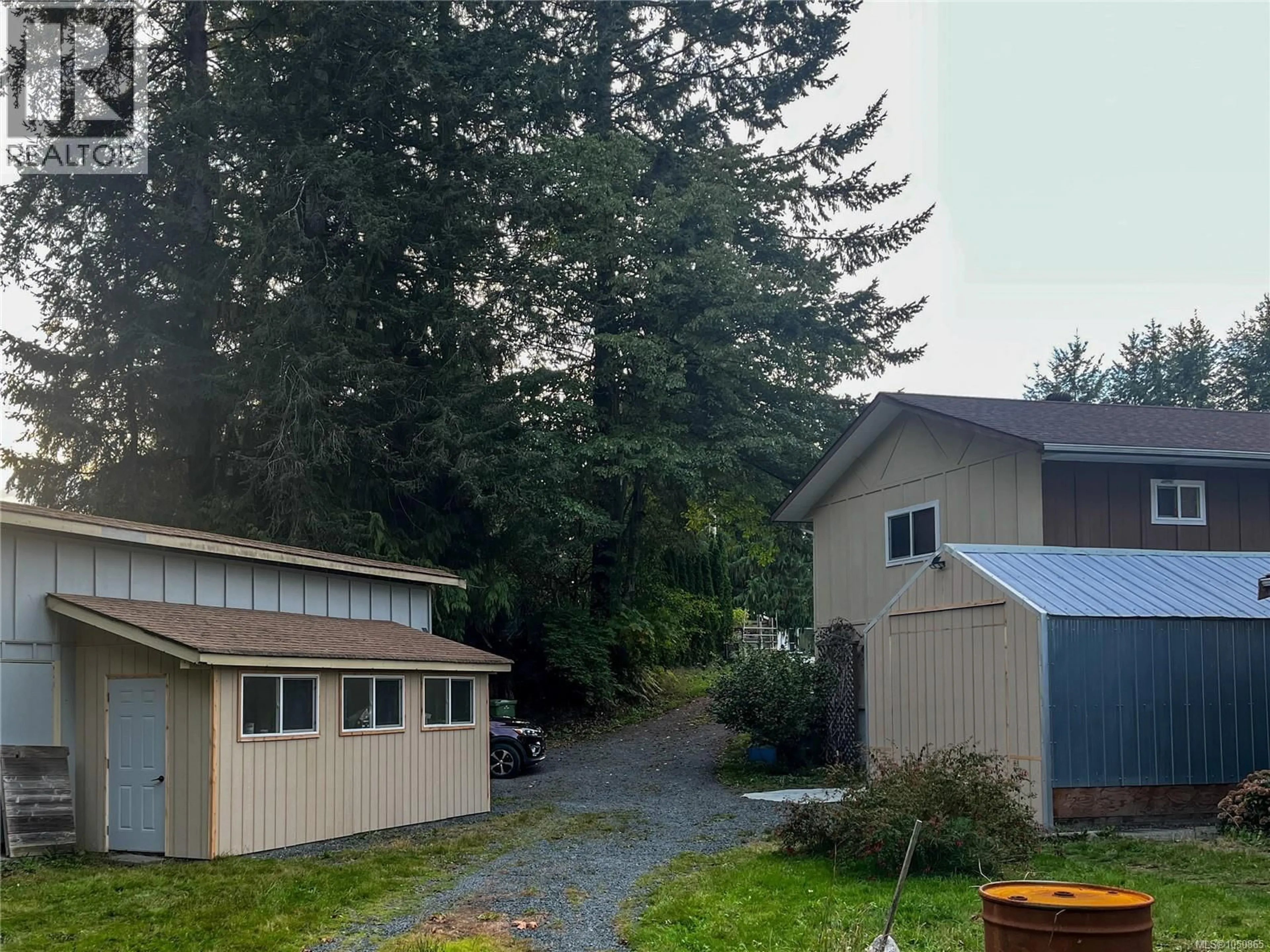A pic from outside/outdoor area/front of a property/back of a property/a pic from drone, unknown for 2243 FEARON ROAD, Campbell River British Columbia V9H1C7