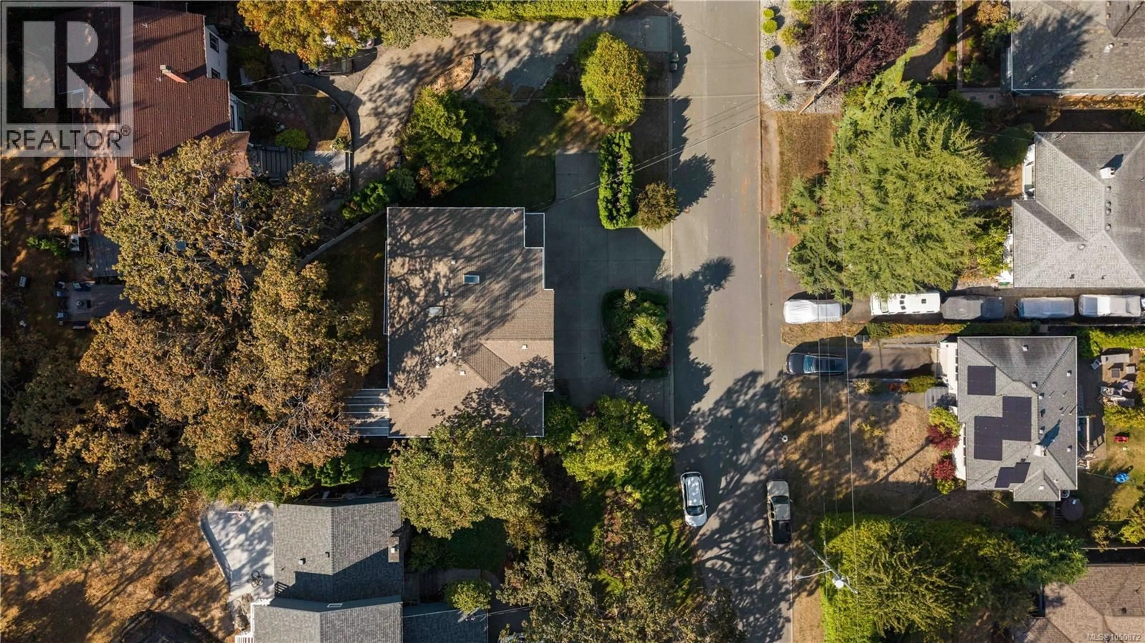A pic from outside/outdoor area/front of a property/back of a property/a pic from drone, street for 3908A ASCOT DRIVE, Saanich British Columbia V8P3S1