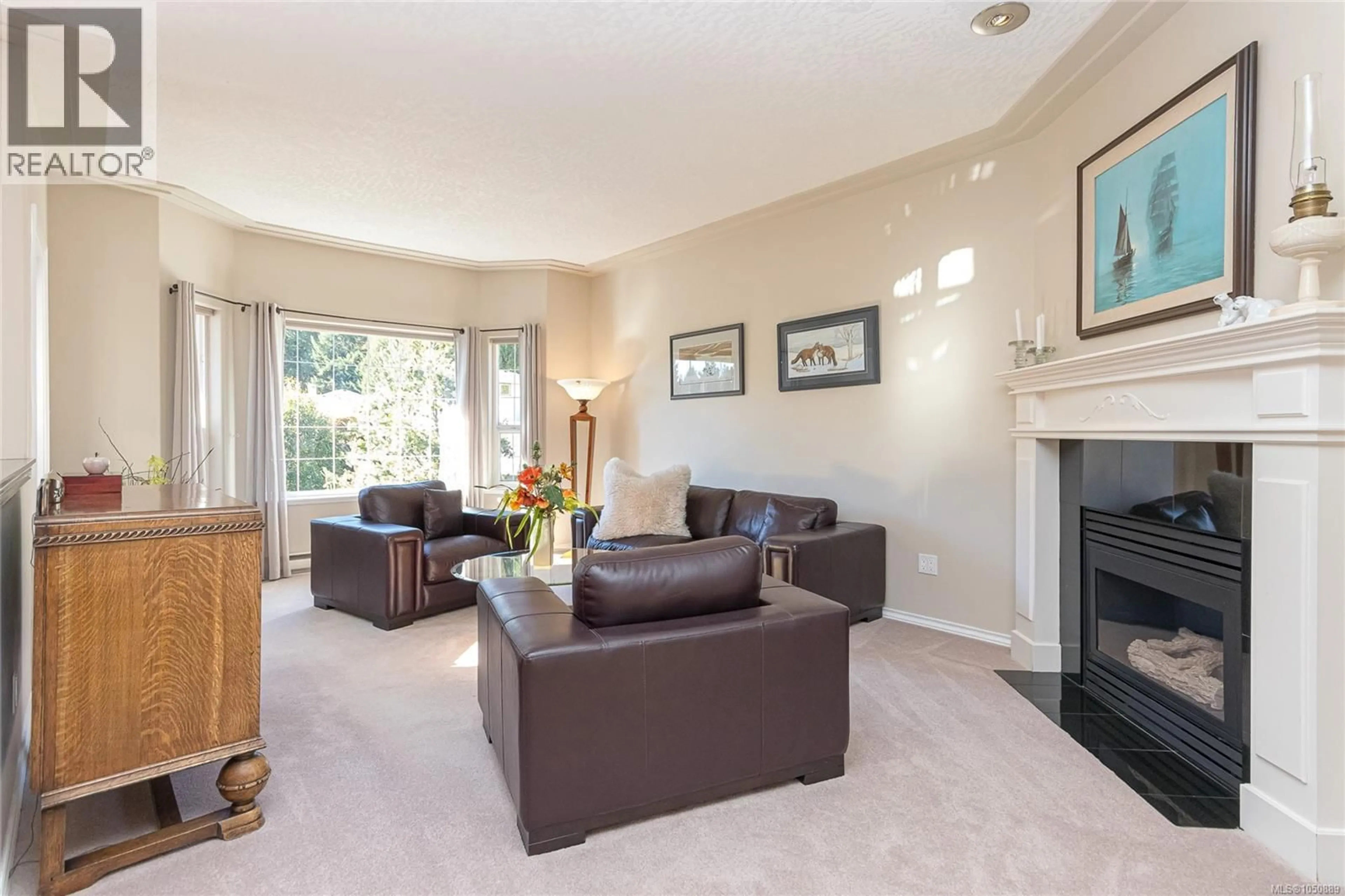 Living room with furniture, unknown for 8593 KINGCOME CRESCENT, North Saanich British Columbia V8L5C4