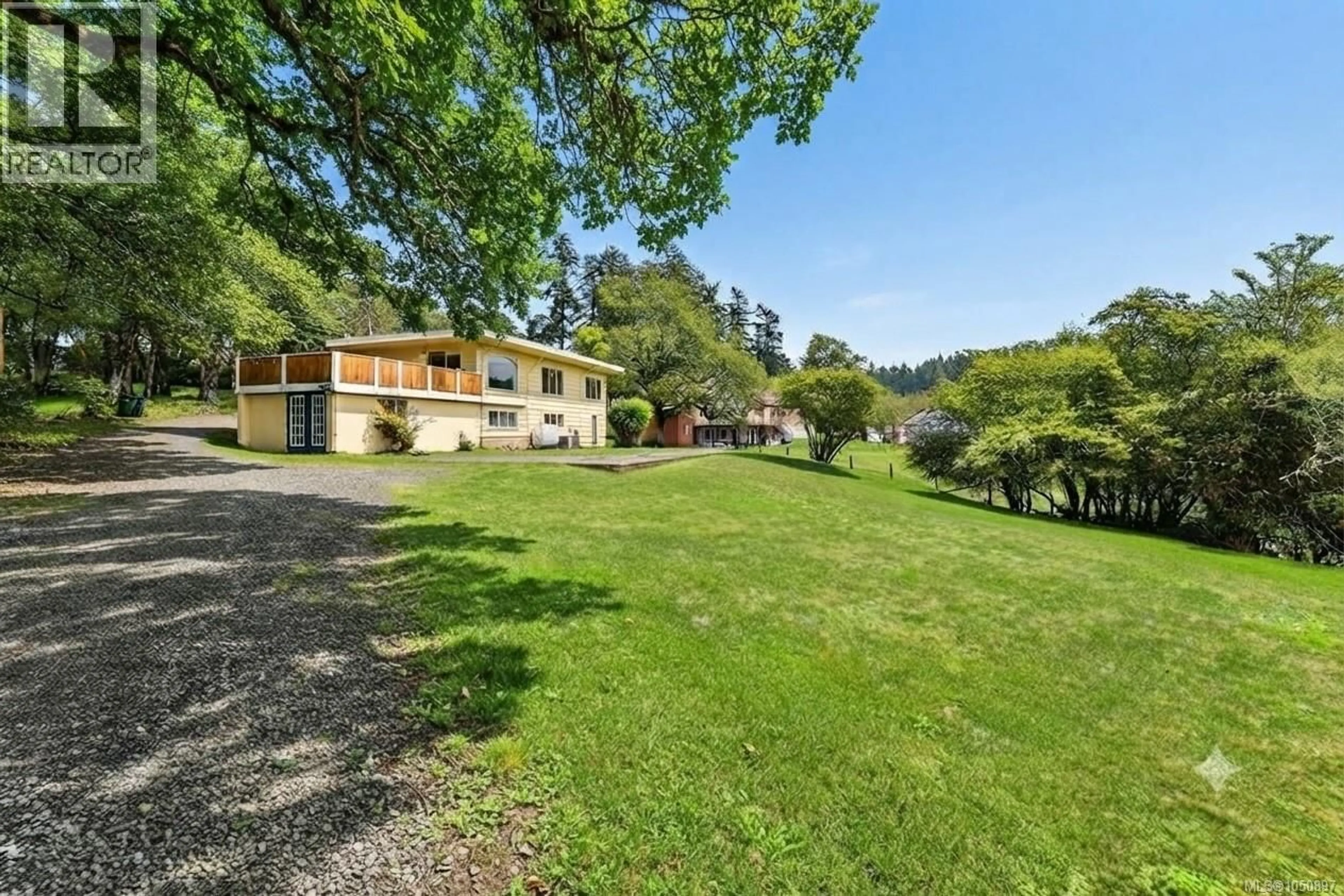 A pic from outside/outdoor area/front of a property/back of a property/a pic from drone, water/lake/river/ocean view for 4589 SCARBOROUGH ROAD, Saanich British Columbia V8Z5N6
