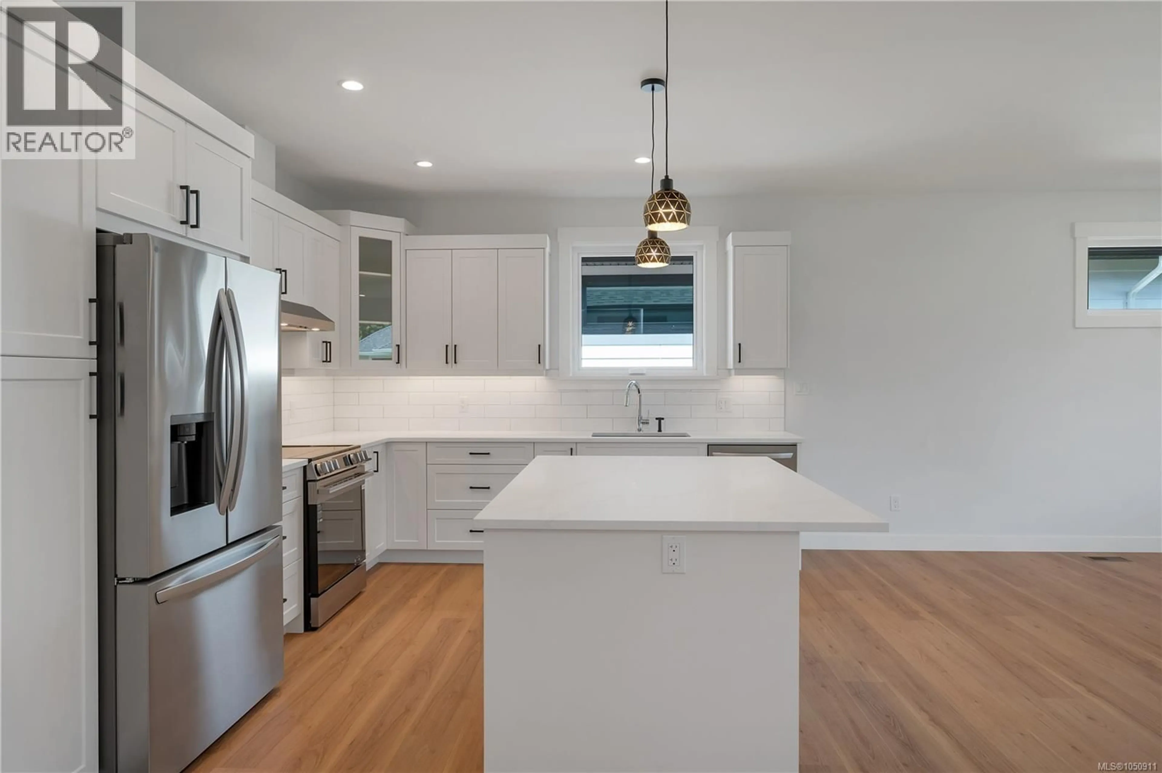 Open concept kitchen, unknown for 756 BEAVER CREEK BOULEVARD, Campbell River British Columbia V9H0G4