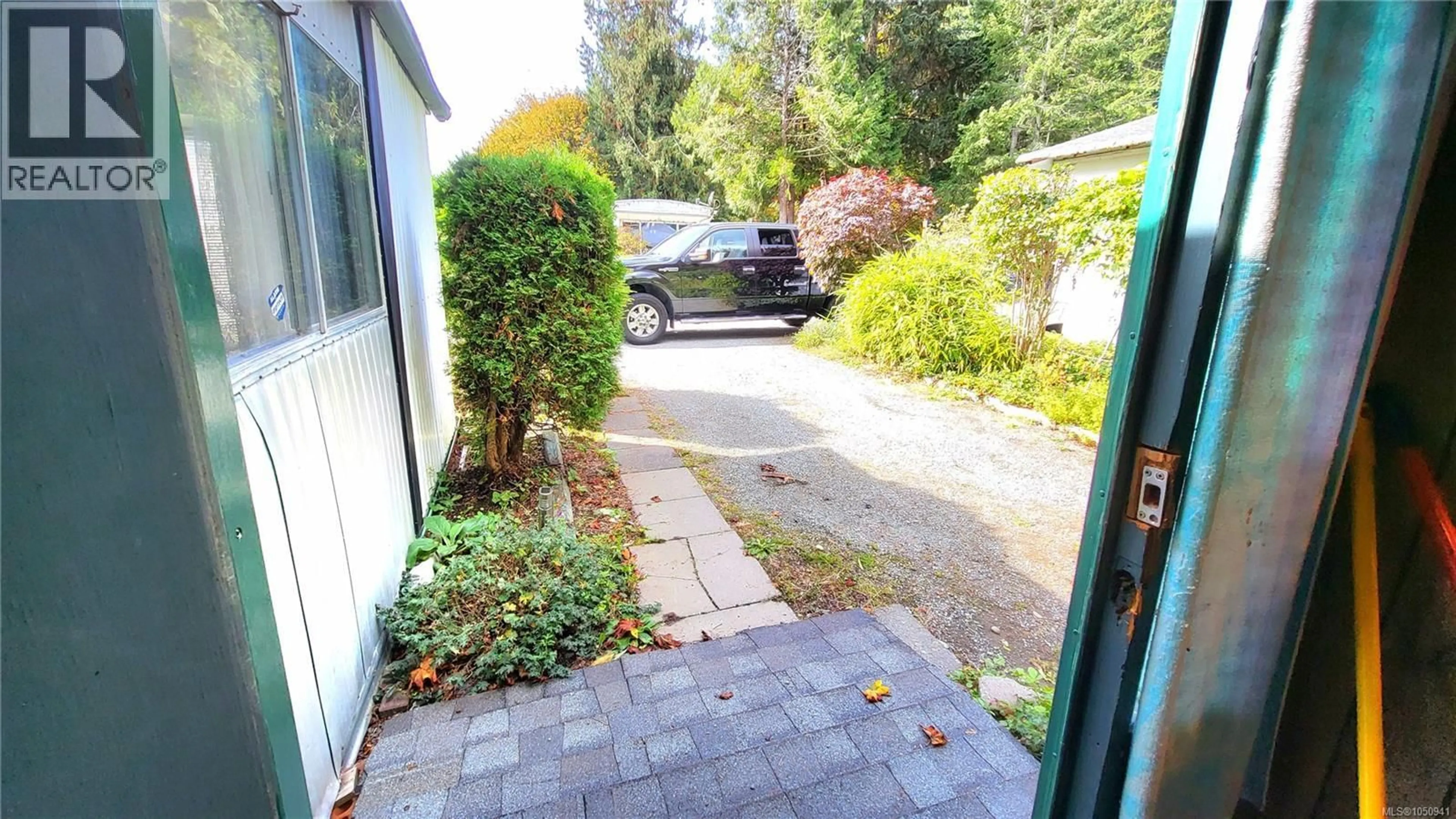 A pic from outside/outdoor area/front of a property/back of a property/a pic from drone, street for 12 - 1655 ALBERNI HIGHWAY, Port Alberni British Columbia V9Y8G8