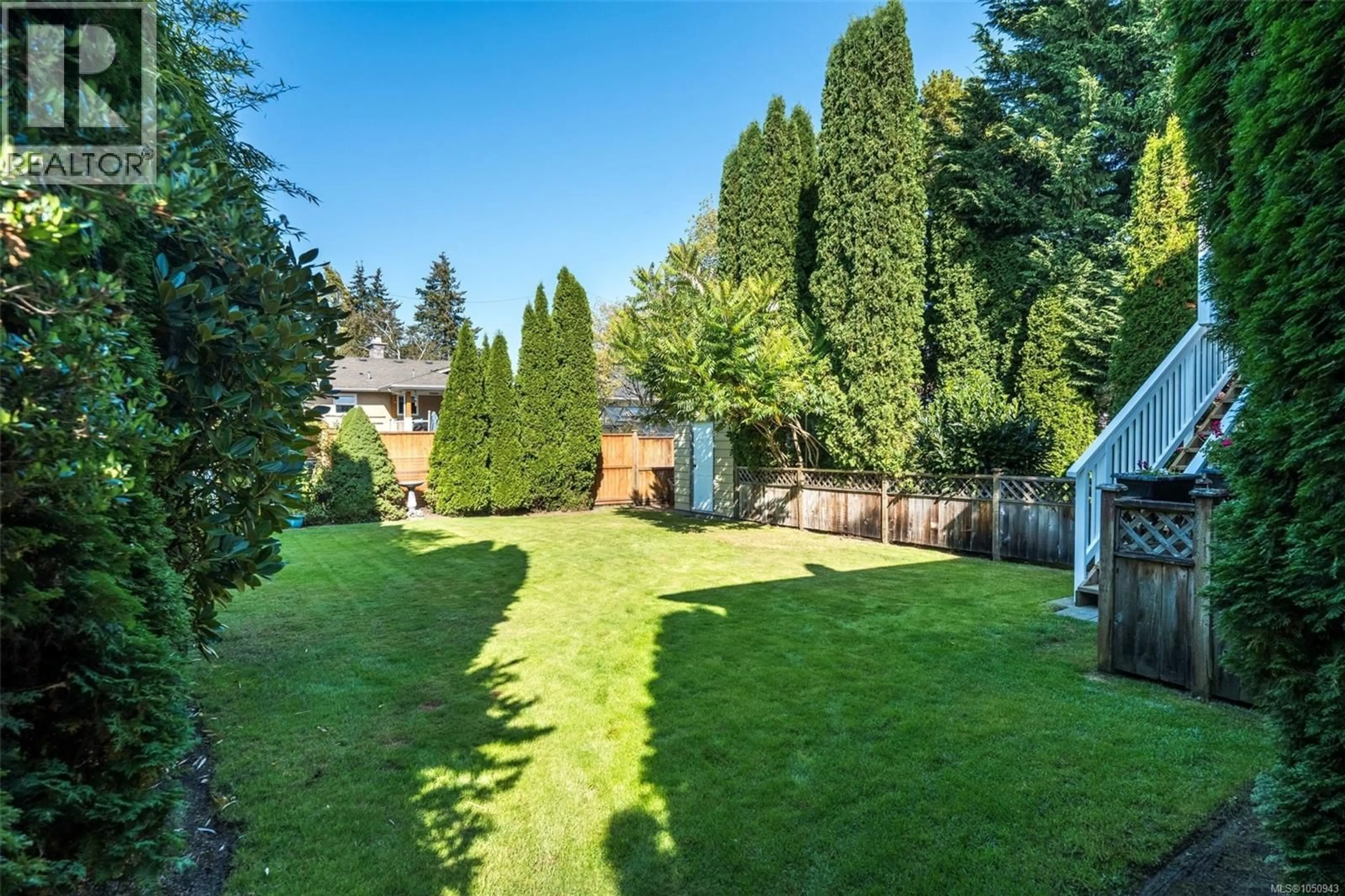A pic from outside/outdoor area/front of a property/back of a property/a pic from drone, forest/trees view for 2244 MALAVIEW AVENUE, Sidney British Columbia V8L2E7