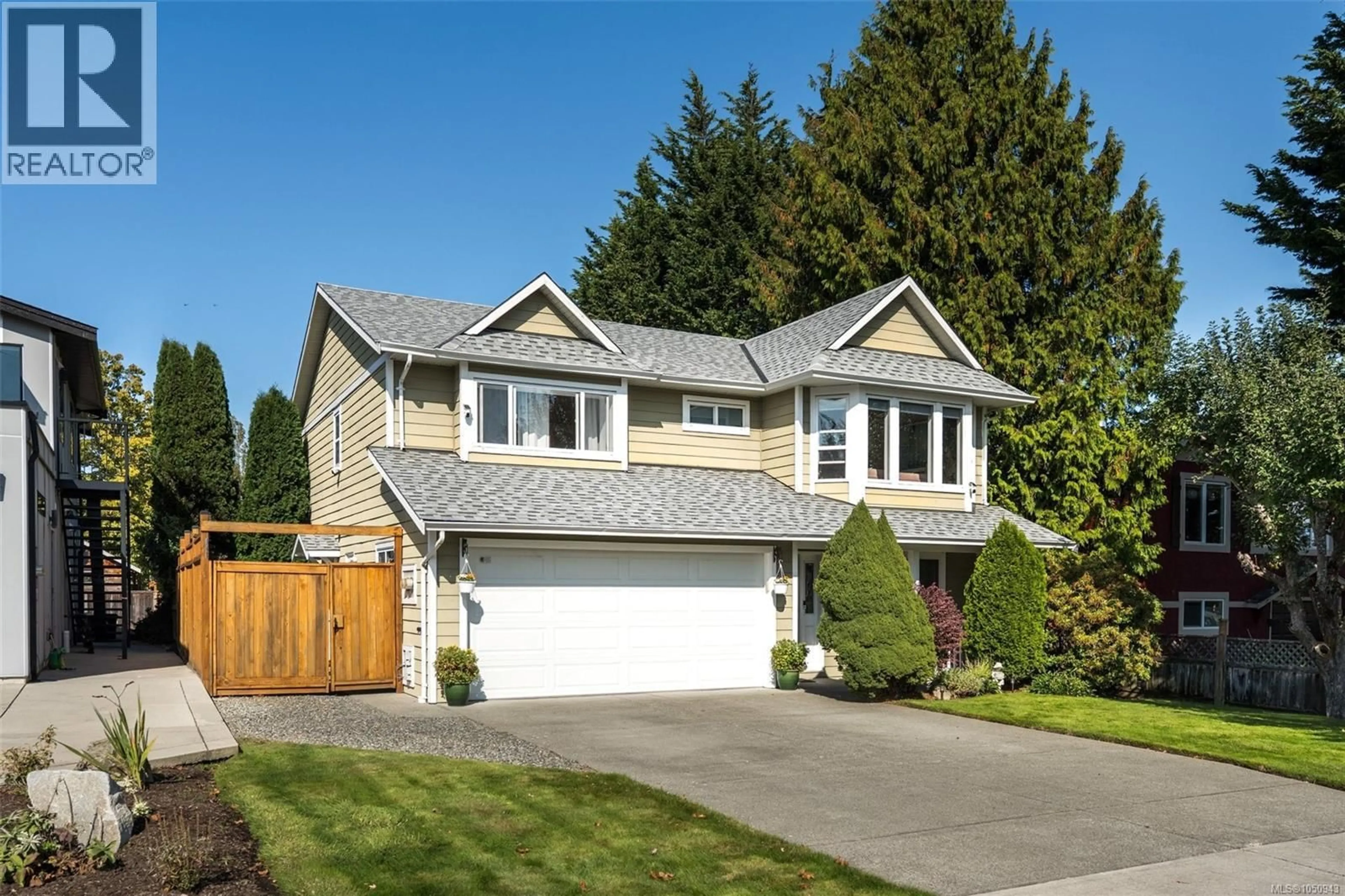 Home with vinyl exterior material, street for 2244 MALAVIEW AVENUE, Sidney British Columbia V8L2E7