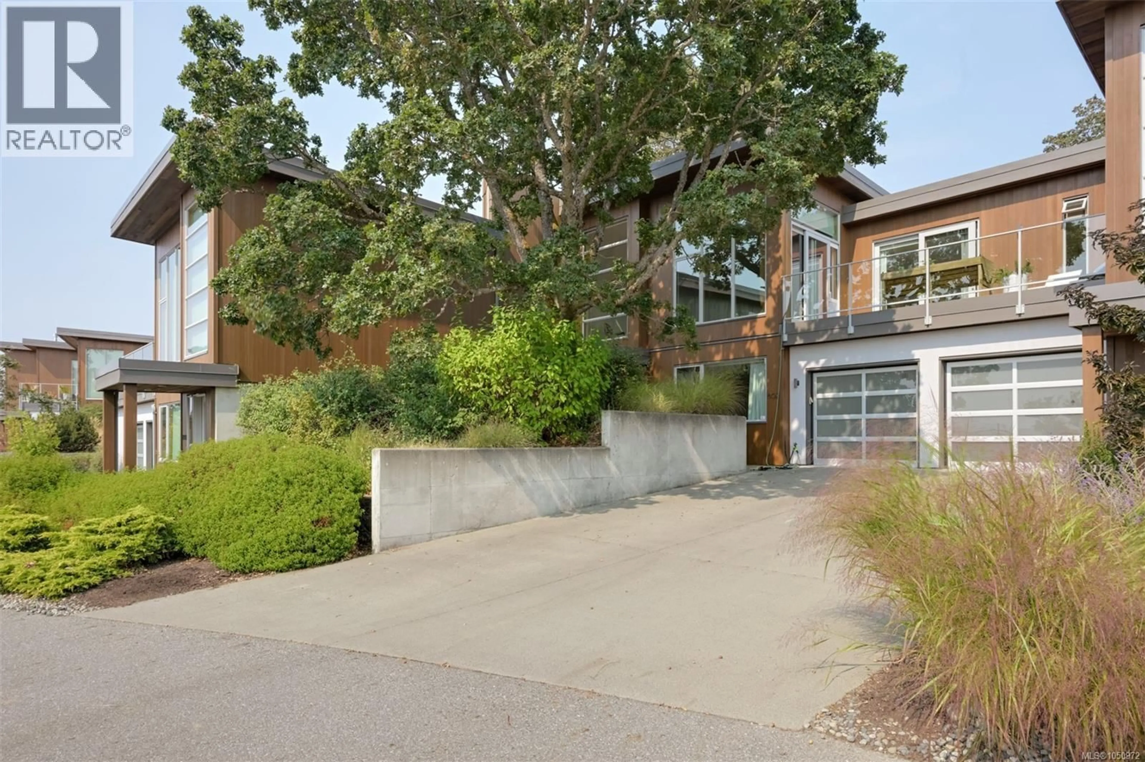 Home with brick exterior material, street for 802 RAINBOW RIDGE LANE, Saanich British Columbia V8X0A6