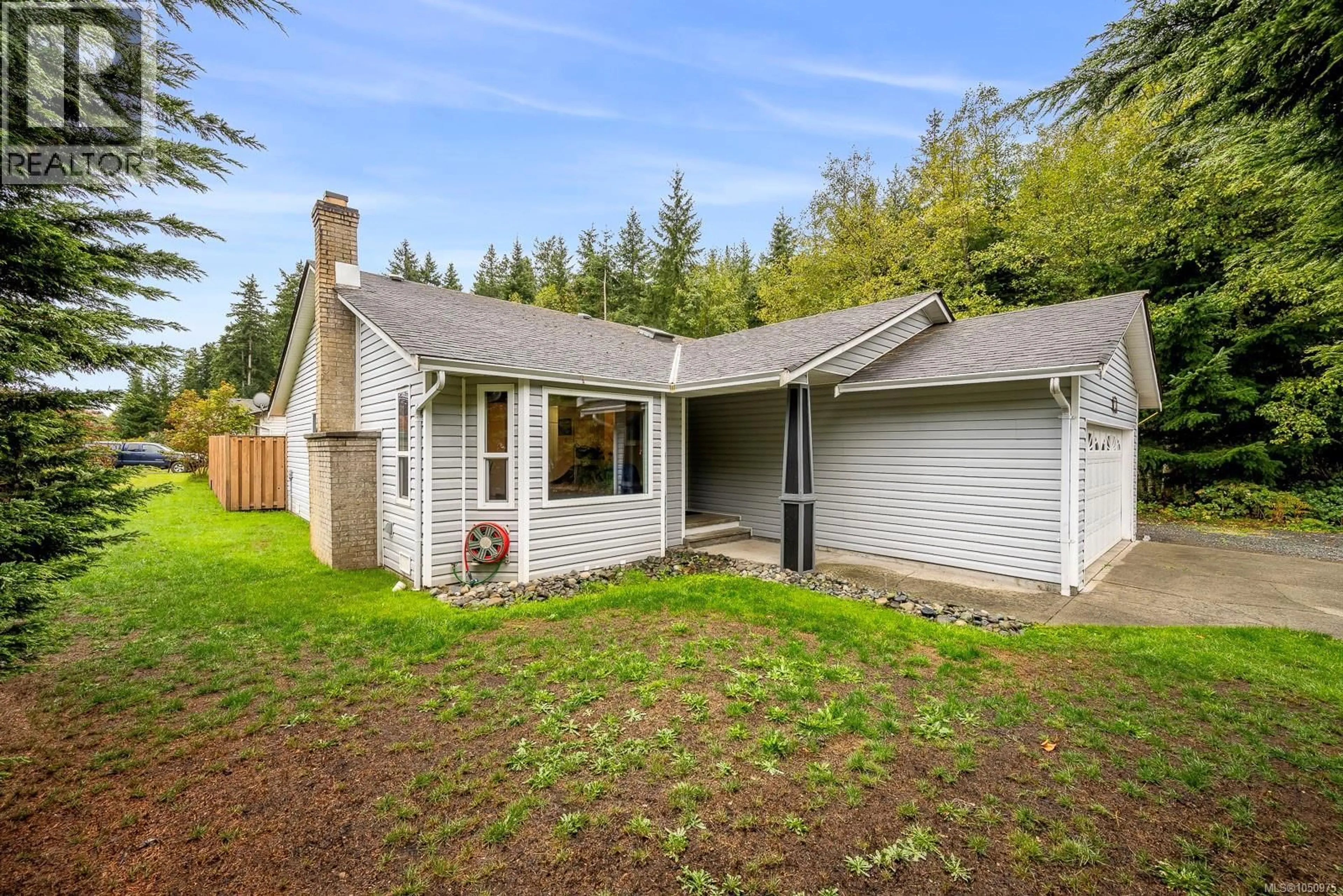 Home with vinyl exterior material, unknown for 610 MCPHEDRAN ROAD SOUTH, Campbell River British Columbia V9W7M7