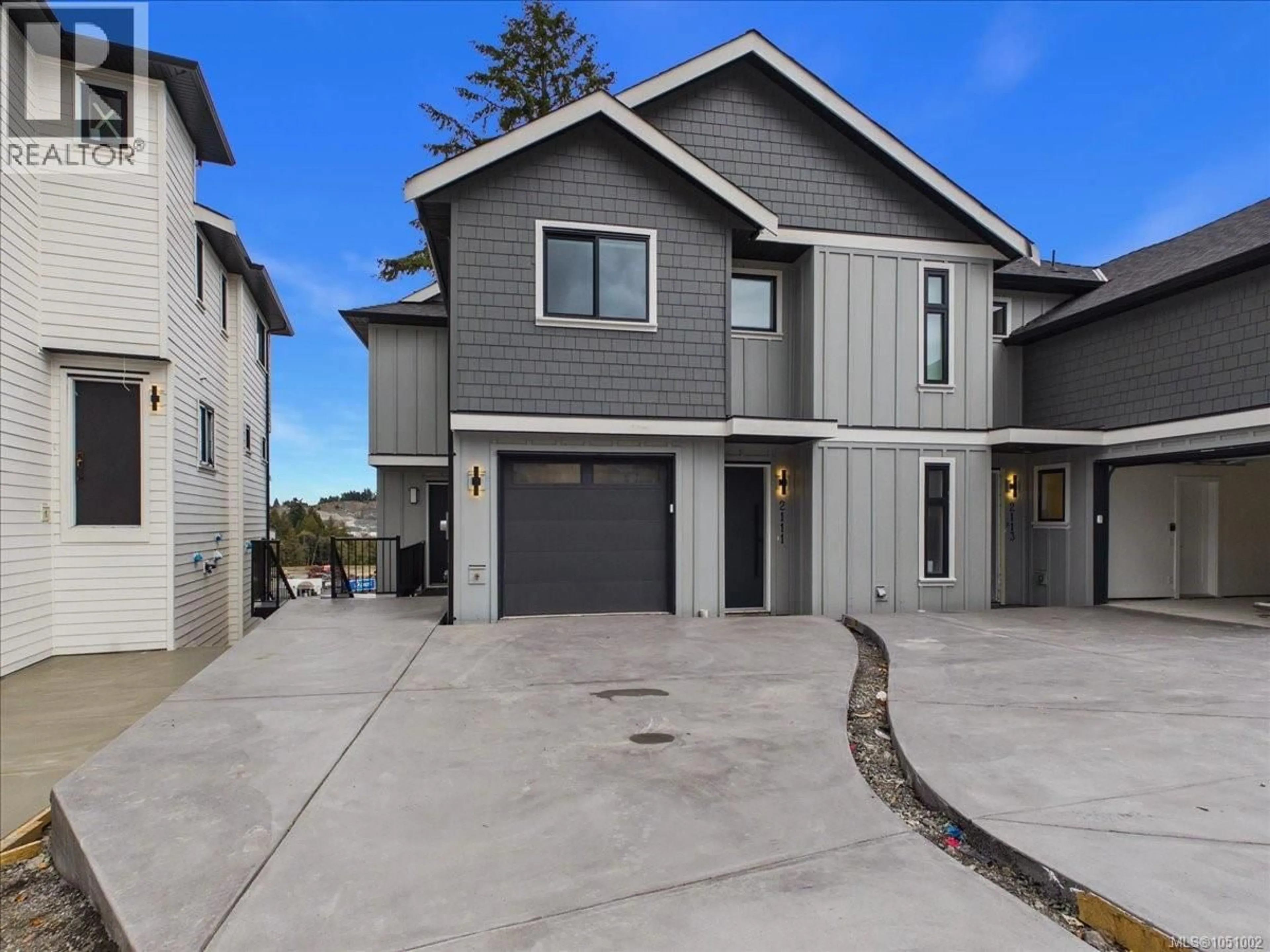 Home with vinyl exterior material, street for 2111 KINGBIRD DRIVE, Langford British Columbia V9B0E7