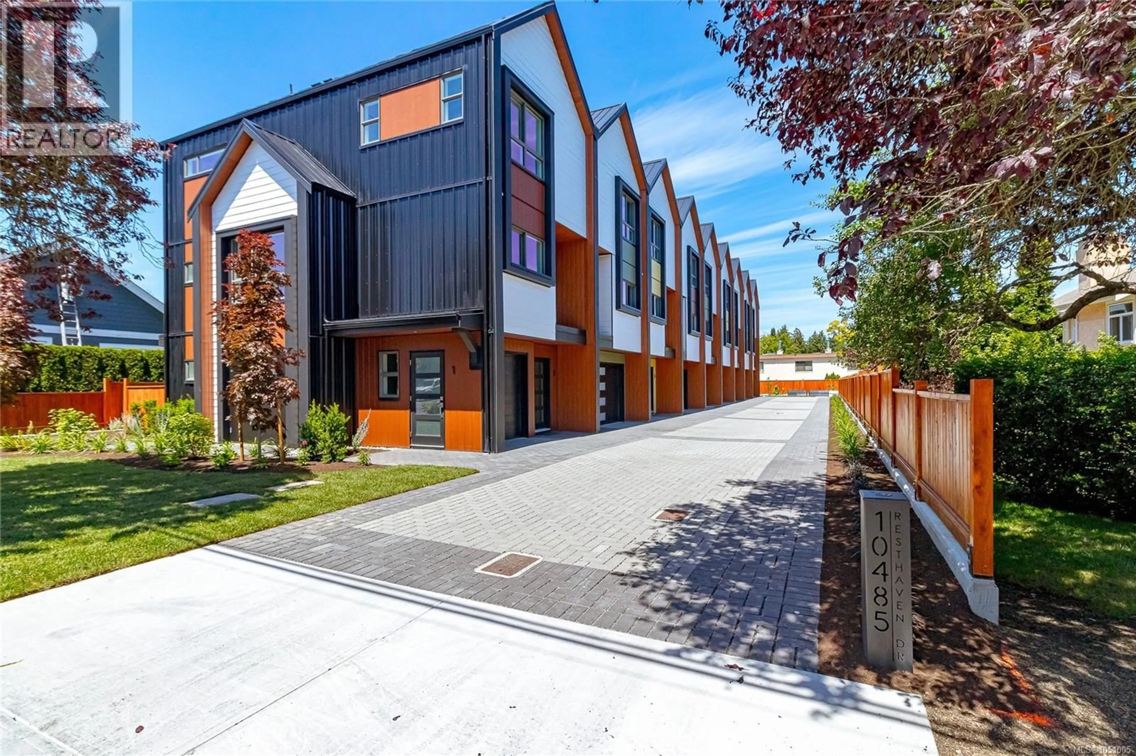 A pic from outside/outdoor area/front of a property/back of a property/a pic from drone, street for 1 - 10485 RESTHAVEN DRIVE, Sidney British Columbia V8L3H6
