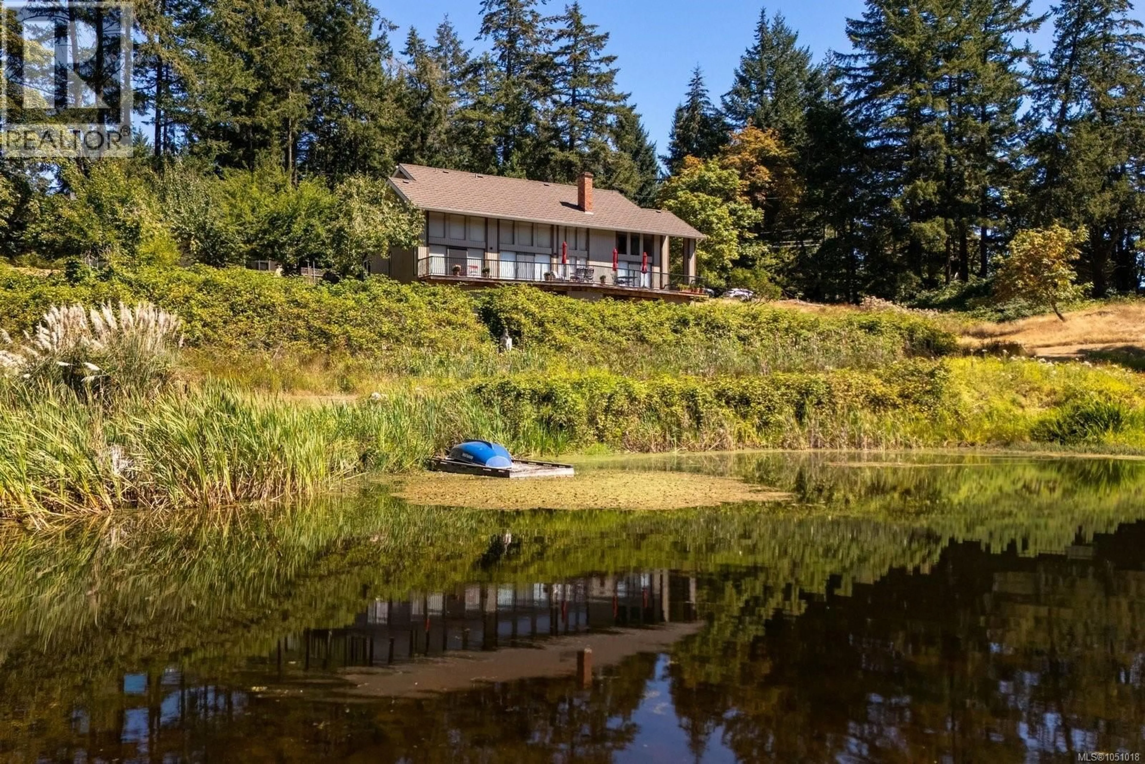 A pic from outside/outdoor area/front of a property/back of a property/a pic from drone, water/lake/river/ocean view for 5320 OLD WEST SAANICH ROAD, Saanich British Columbia V9E2A9