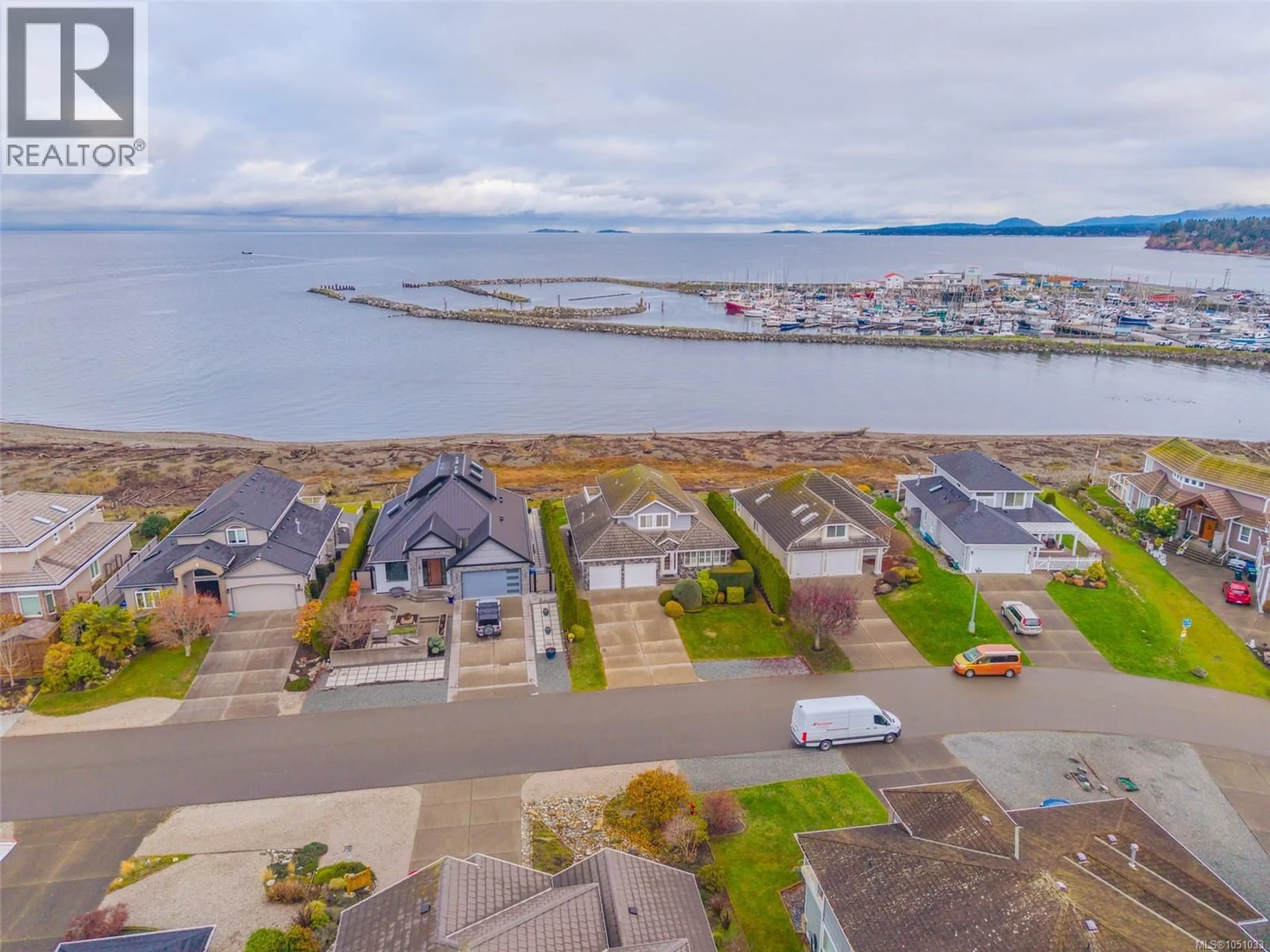 A pic from outside/outdoor area/front of a property/back of a property/a pic from drone, water/lake/river/ocean view for 1765 ADMIRAL TRYON BOULEVARD, French Creek British Columbia V9P2V2