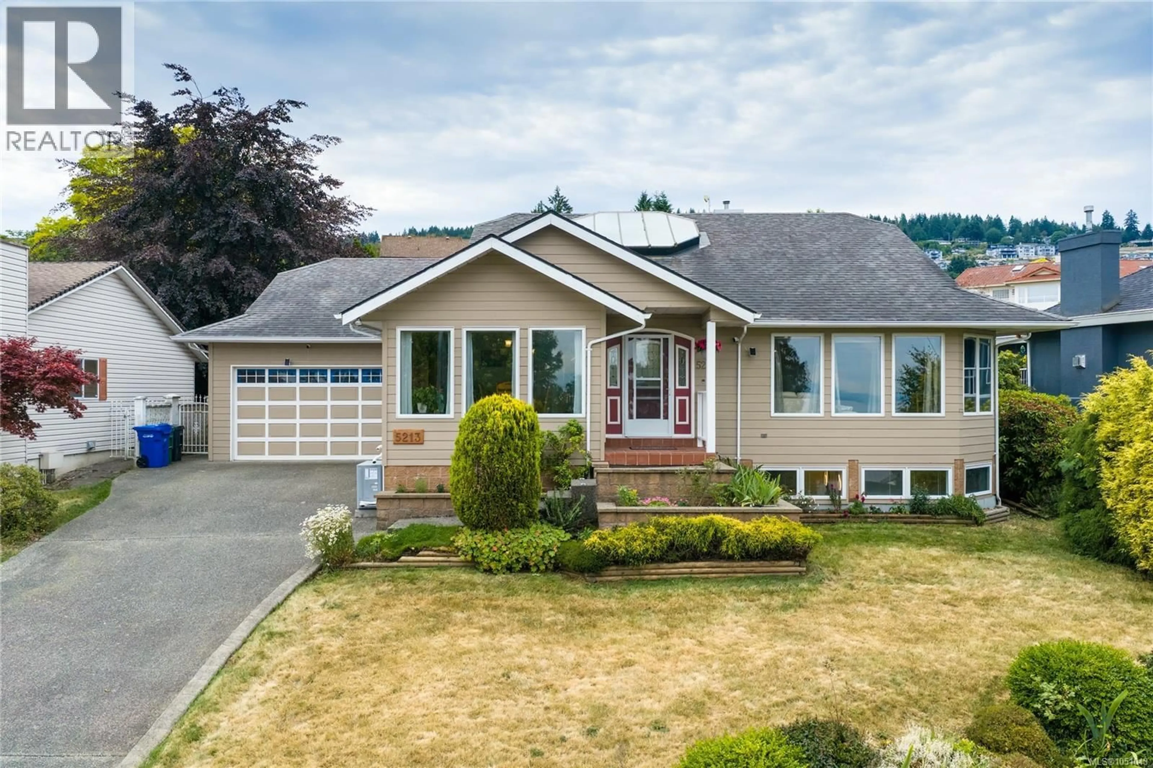 Home with vinyl exterior material, street for 5213 FILLINGER CRESCENT, Nanaimo British Columbia V9V1H7