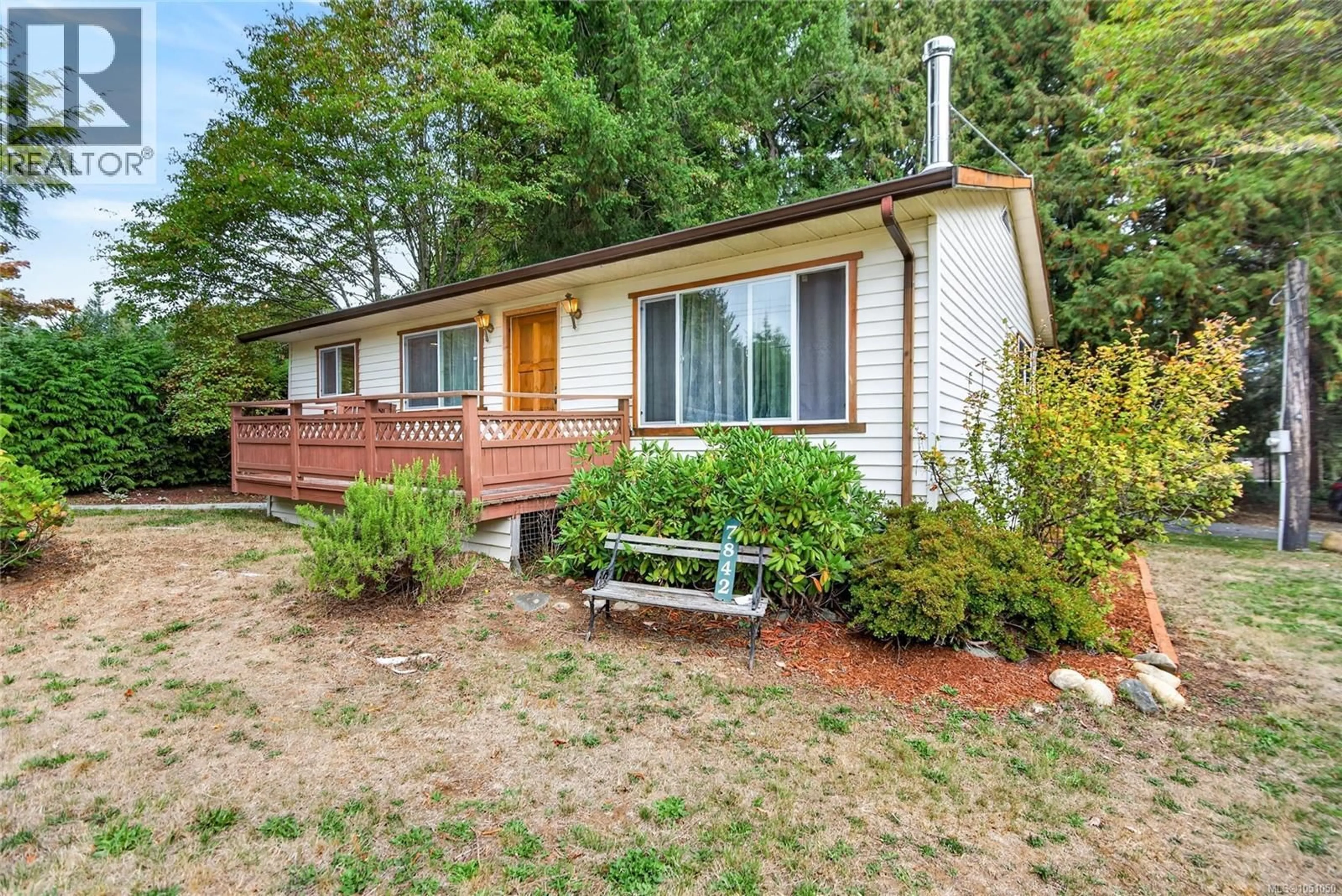 Home with vinyl exterior material, street for 7842 TOZER ROAD, Fanny Bay British Columbia V0R1W0