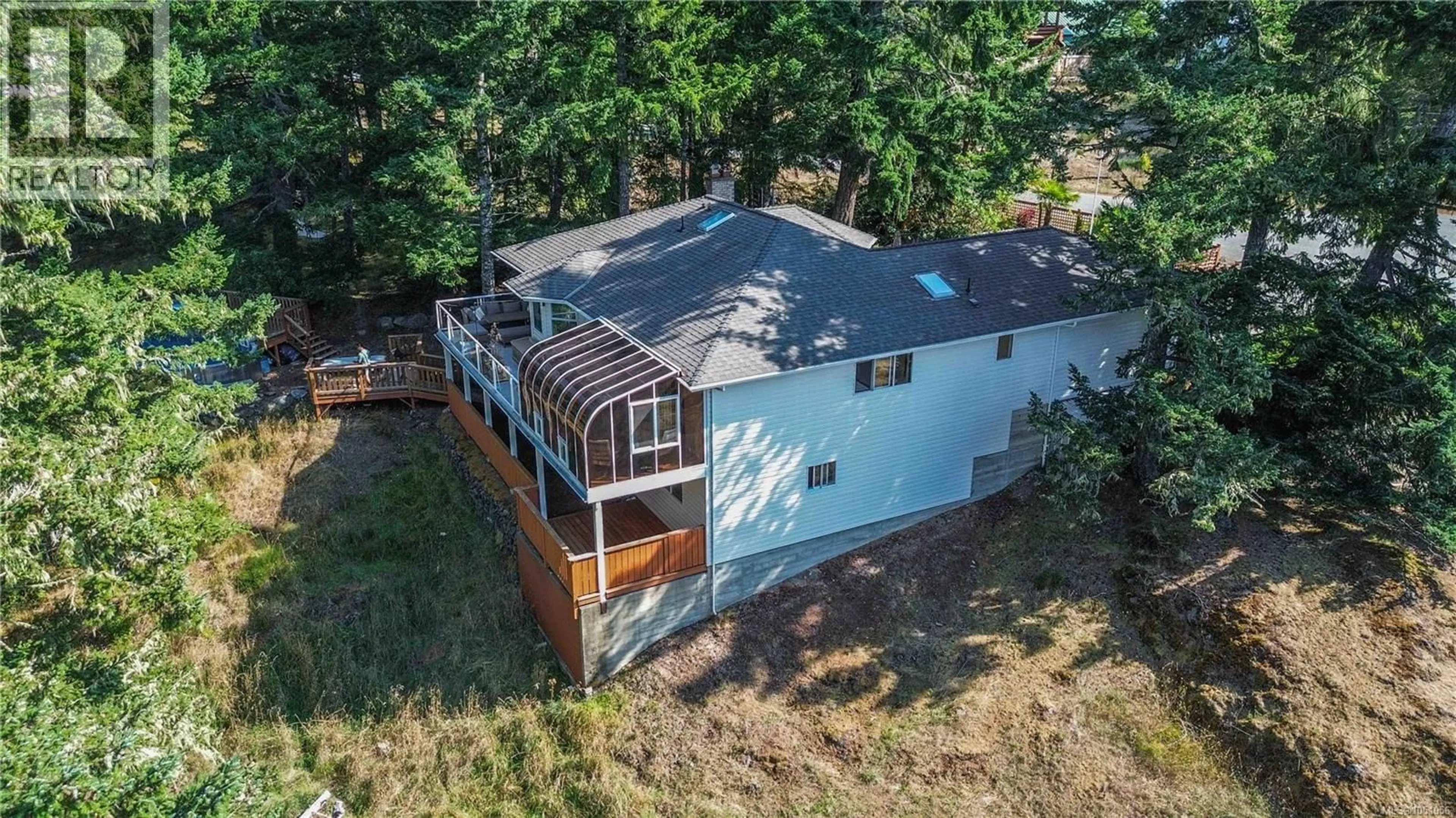A pic from outside/outdoor area/front of a property/back of a property/a pic from drone, unknown for 646 CAINS WAY, Sooke British Columbia V9Z1C6