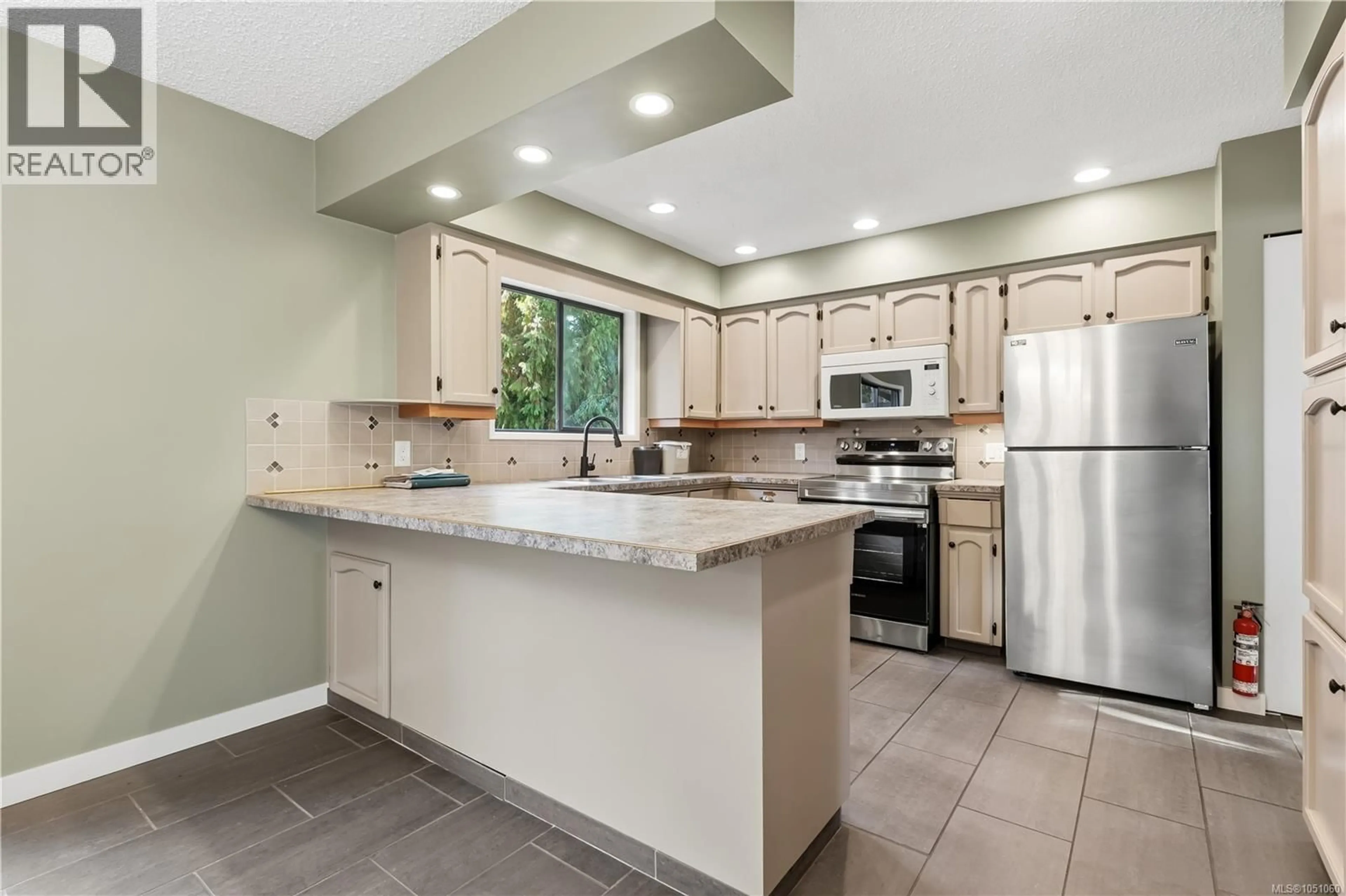 Open concept kitchen, ceramic/tile floor for 1258 RUPERT ROAD, Ucluelet British Columbia V0R3A0