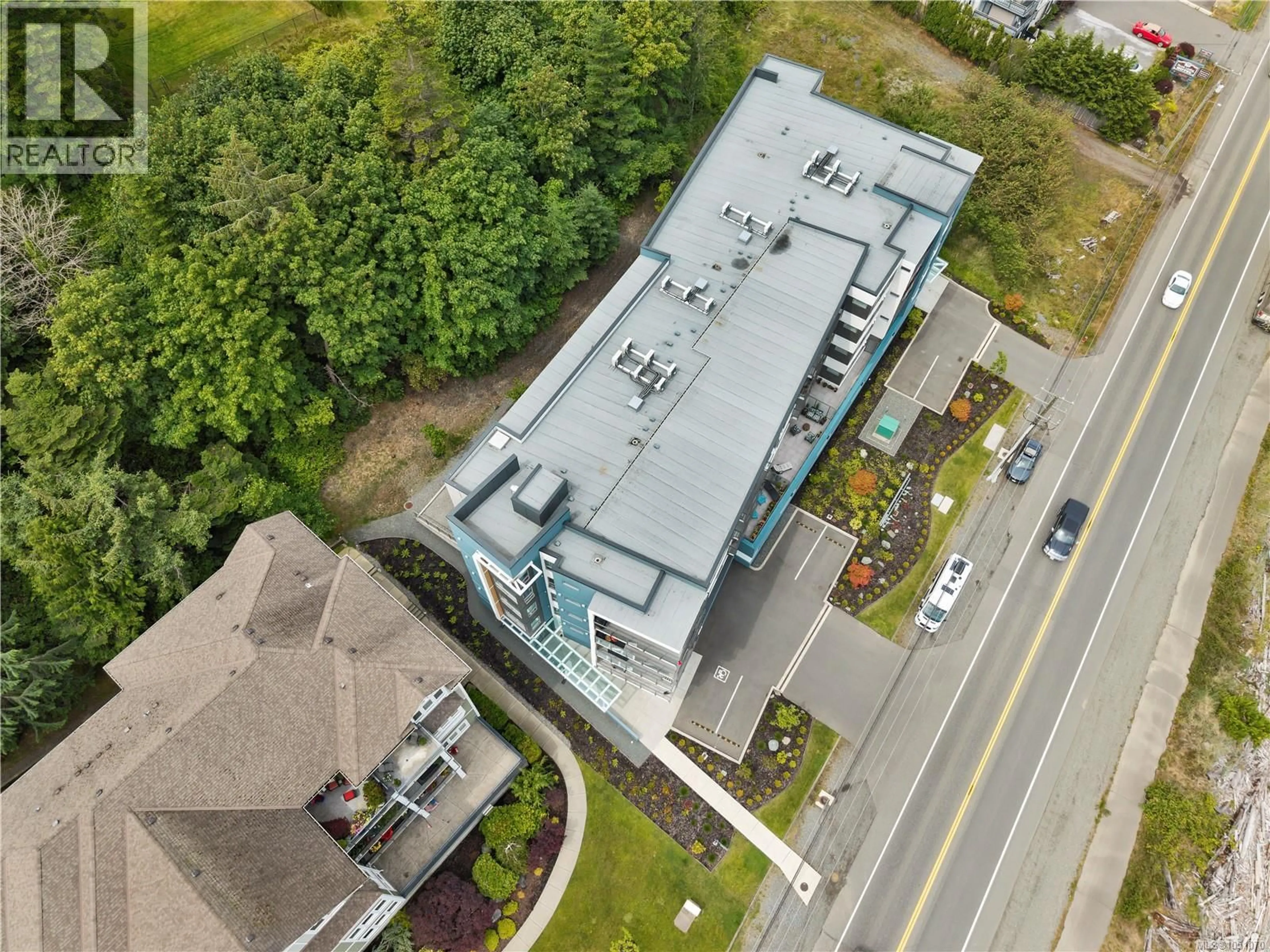 A pic from outside/outdoor area/front of a property/back of a property/a pic from drone, building for 404 - 536 ISLAND HIGHWAY SOUTH, Campbell River British Columbia V9W1A5