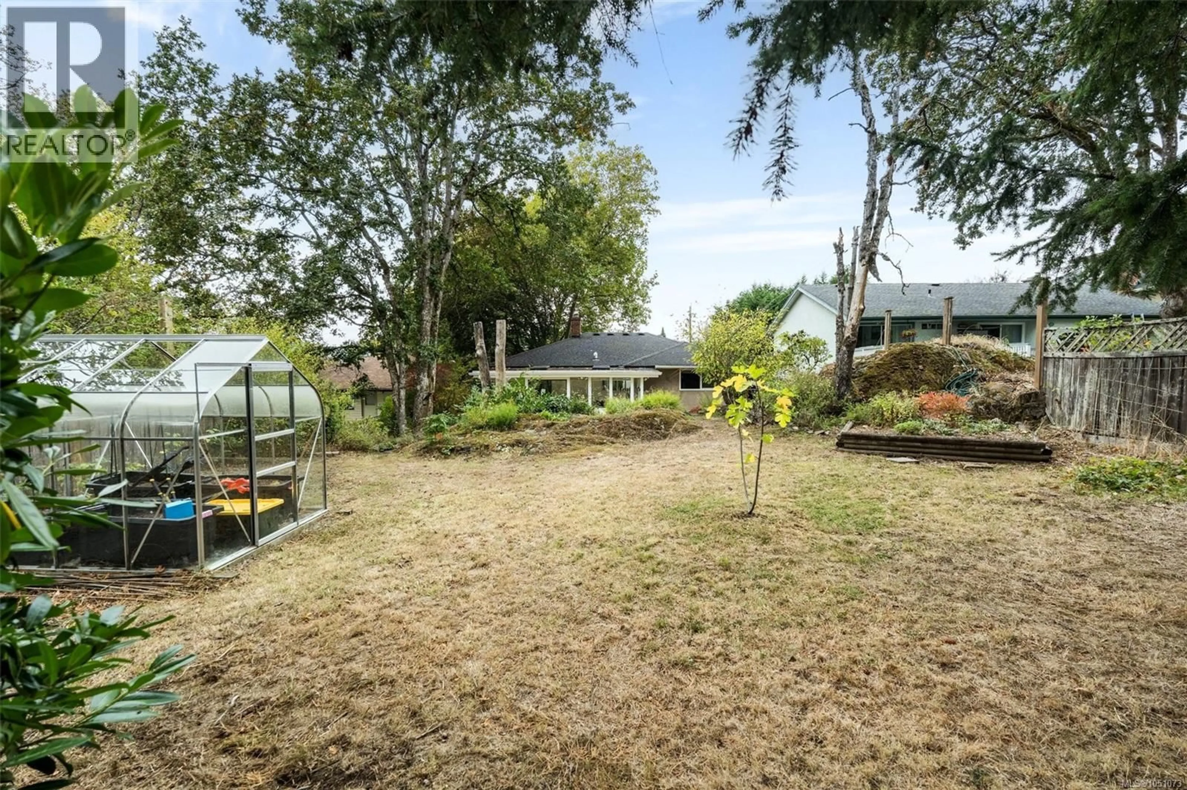 A pic from outside/outdoor area/front of a property/back of a property/a pic from drone, water/lake/river/ocean view for 14 EATON AVENUE, View Royal British Columbia V8Z5E1