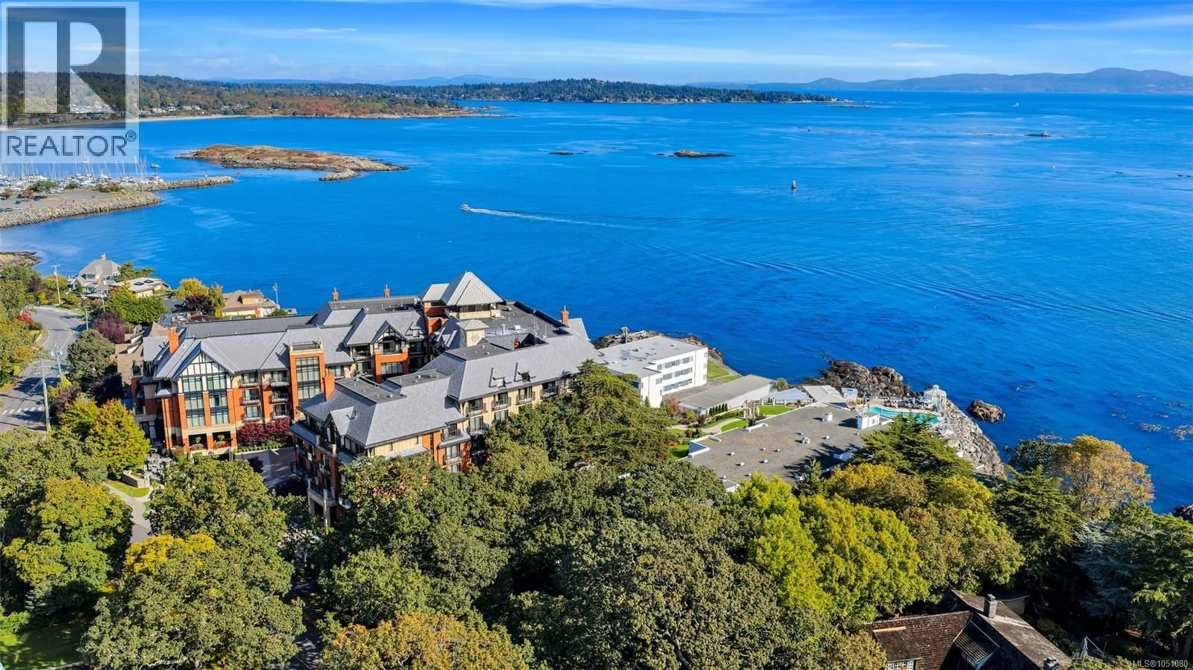 A pic from outside/outdoor area/front of a property/back of a property/a pic from drone, water/lake/river/ocean view for 407 - 1159 BEACH DRIVE, Oak Bay British Columbia V8S2N2