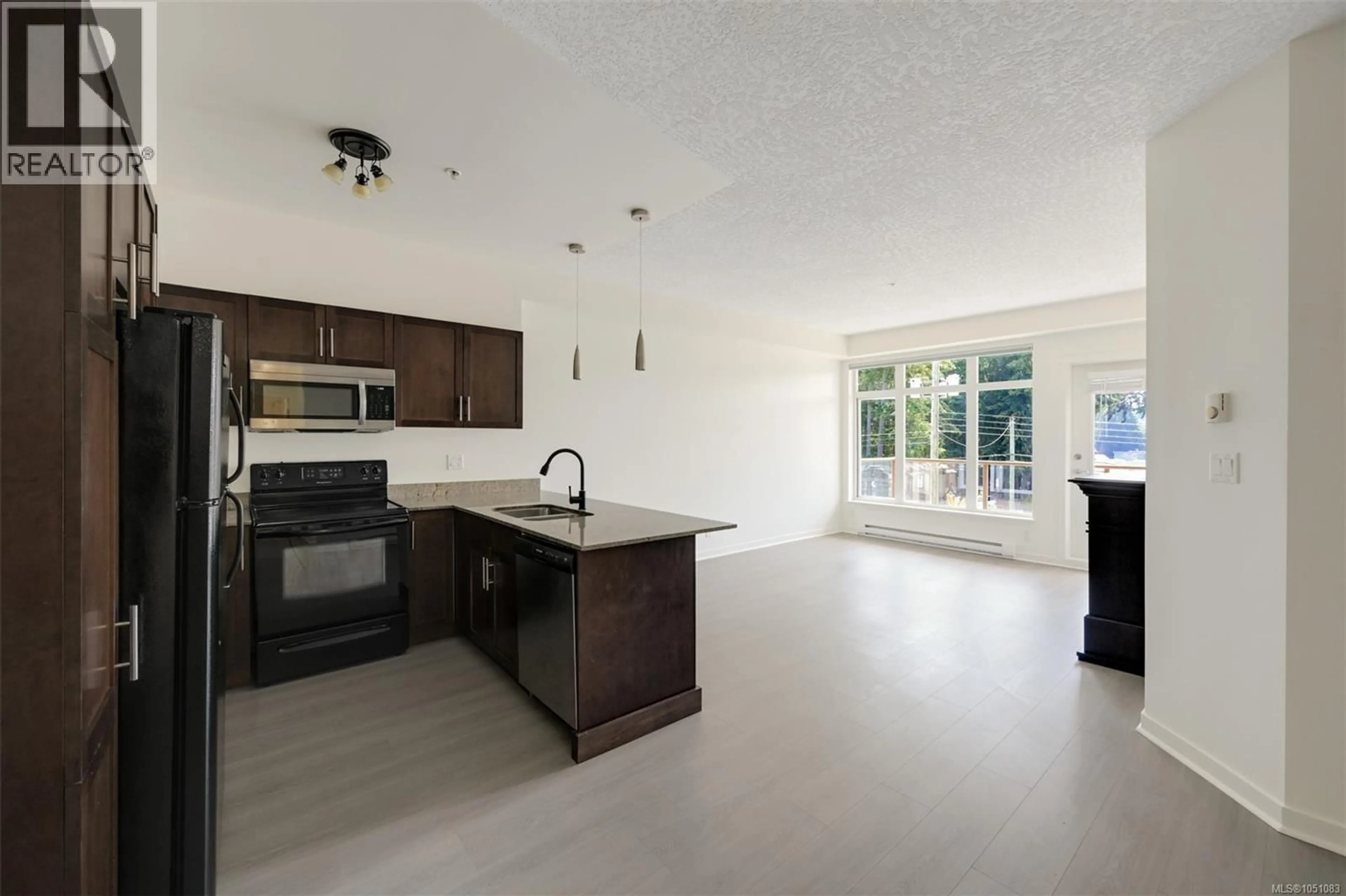 Open concept kitchen, unknown for 305 - 2220 SOOKE ROAD, Colwood British Columbia V9B0G9