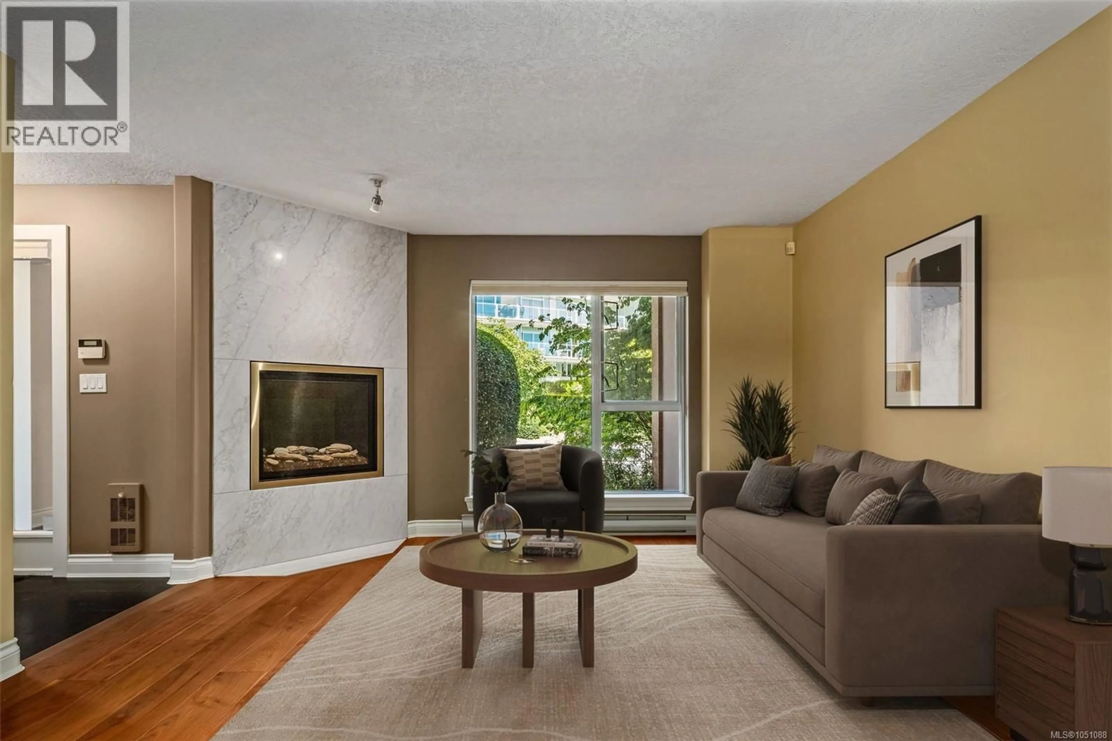 Living room with furniture, unknown for 106 - 75 SONGHEES ROAD, Victoria British Columbia V9A7M5
