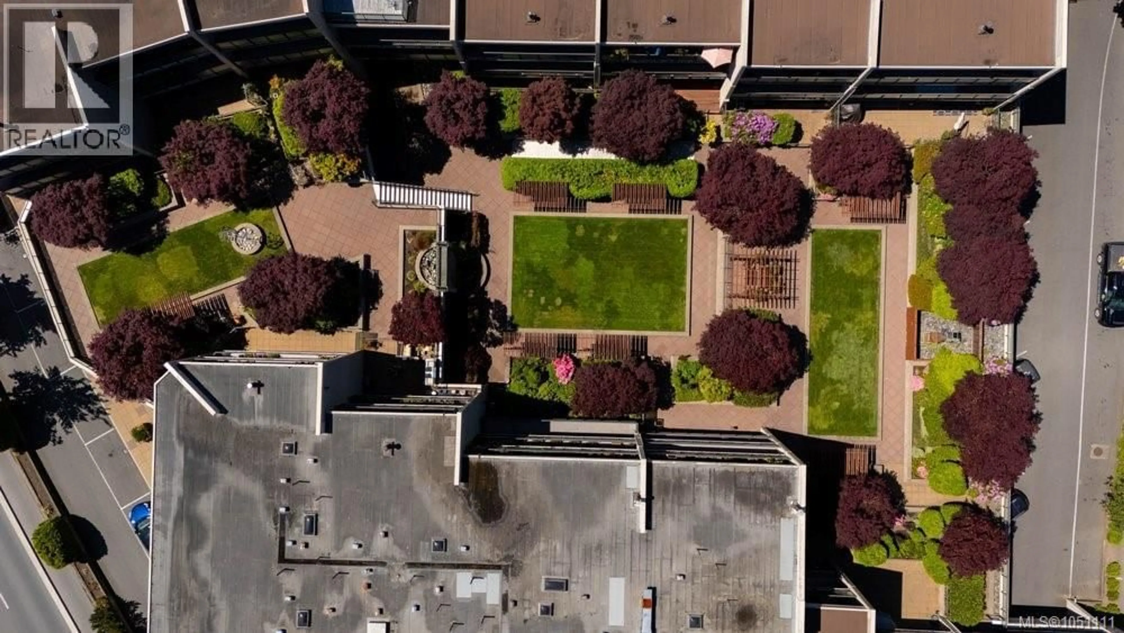 A pic from outside/outdoor area/front of a property/back of a property/a pic from drone, street for 306 - 1545 PANDORA AVENUE, Victoria British Columbia V8R6R1