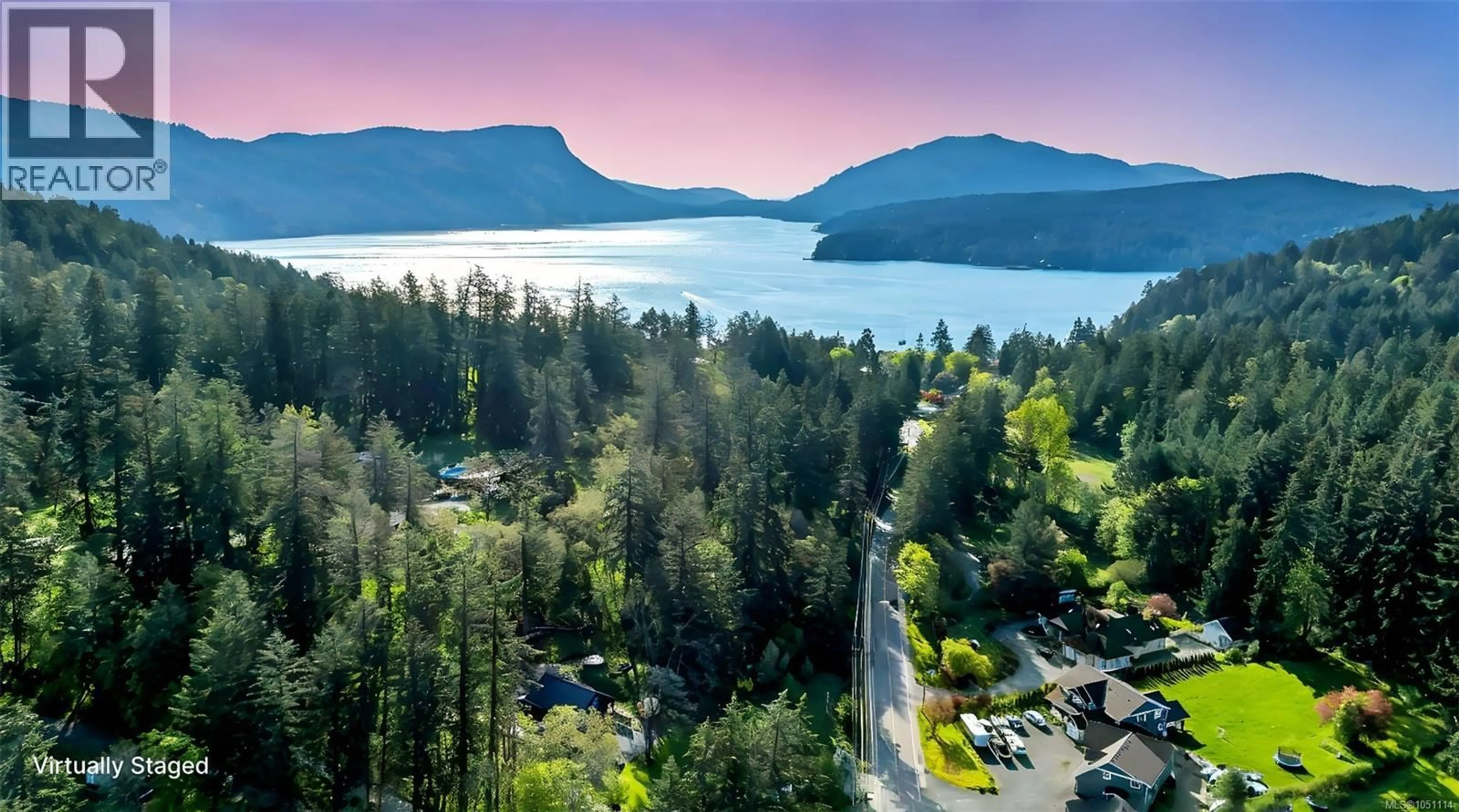 A pic from outside/outdoor area/front of a property/back of a property/a pic from drone, water/lake/river/ocean view for 1029 HERD ROAD, Duncan British Columbia V9L5W9