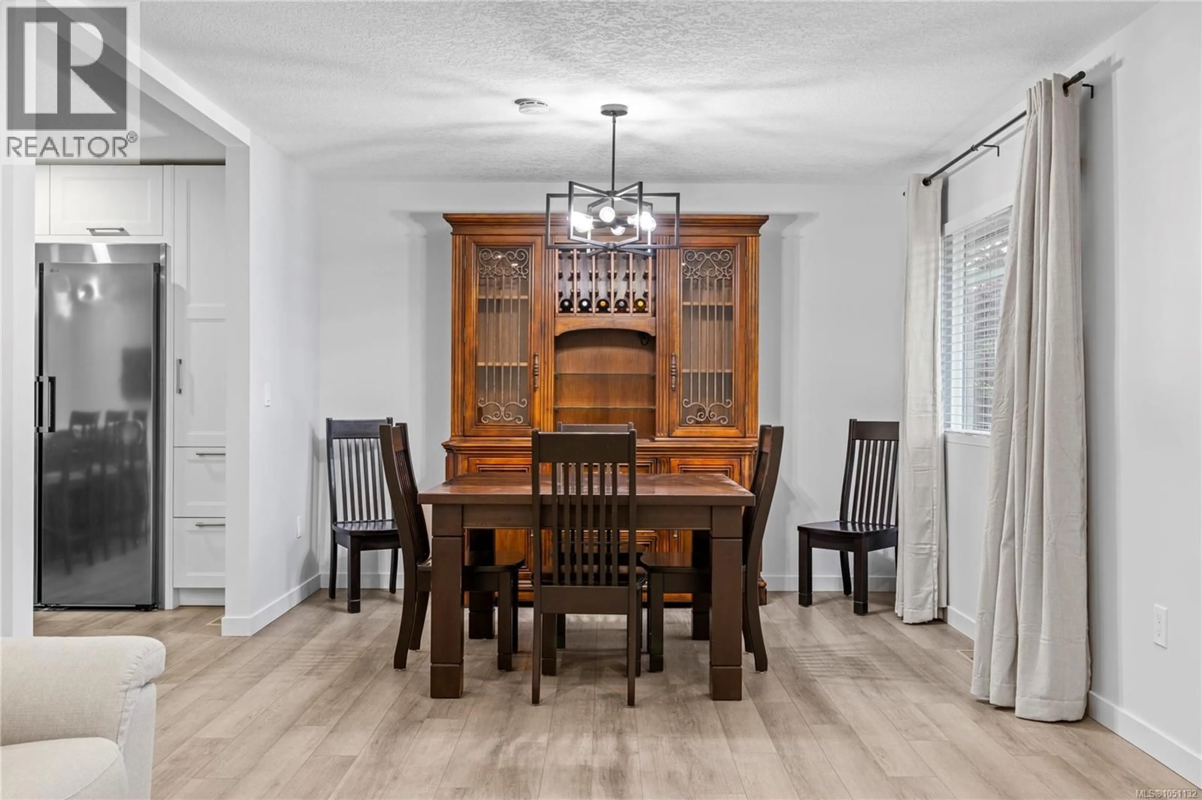 Dining room, wood/laminate floor for 1350 GREENWOOD WAY, French Creek British Columbia V9P1X1