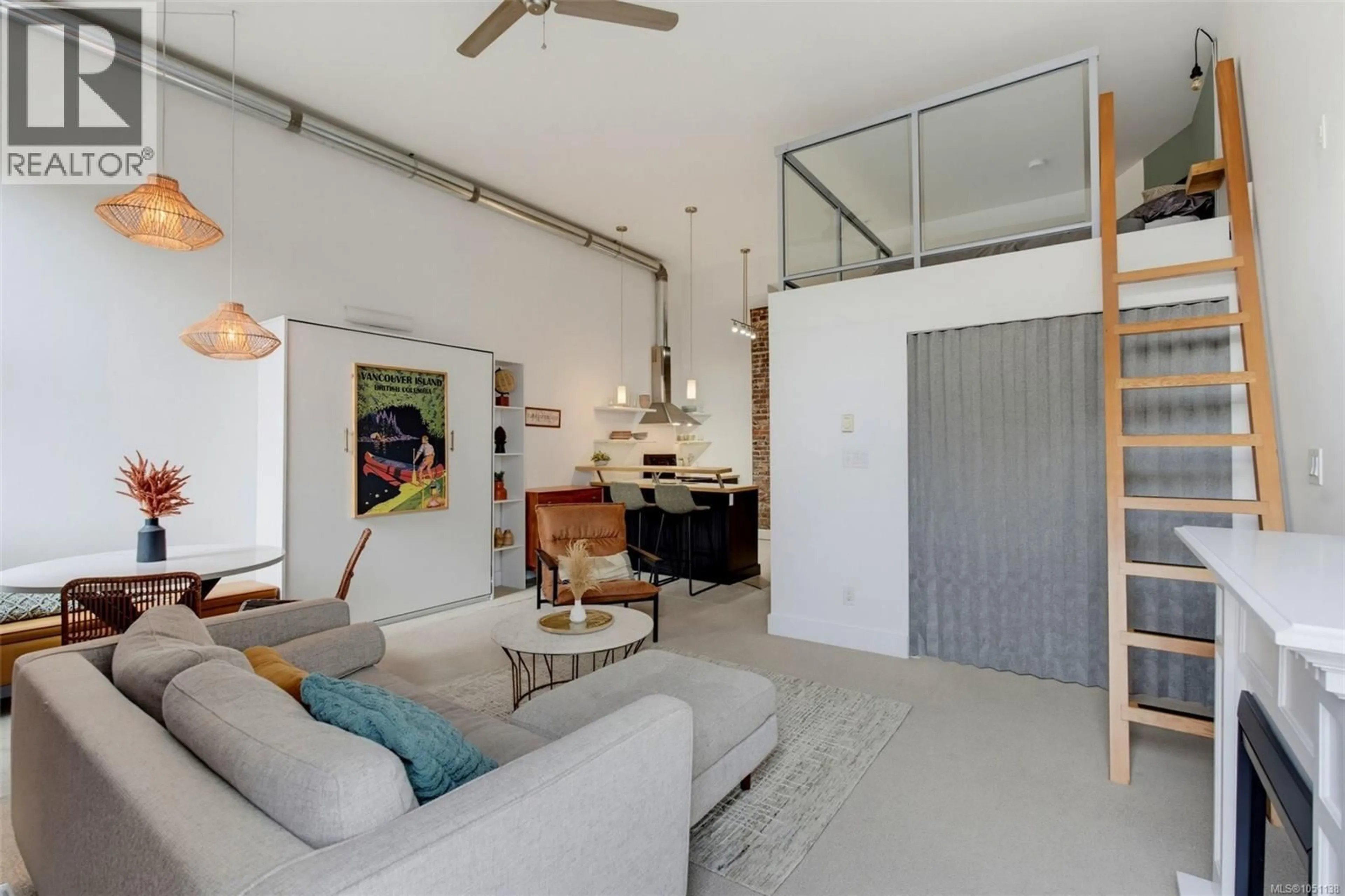 Living room with furniture, cement floor for 213 - 562 YATES STREET, Victoria British Columbia V8W1K8