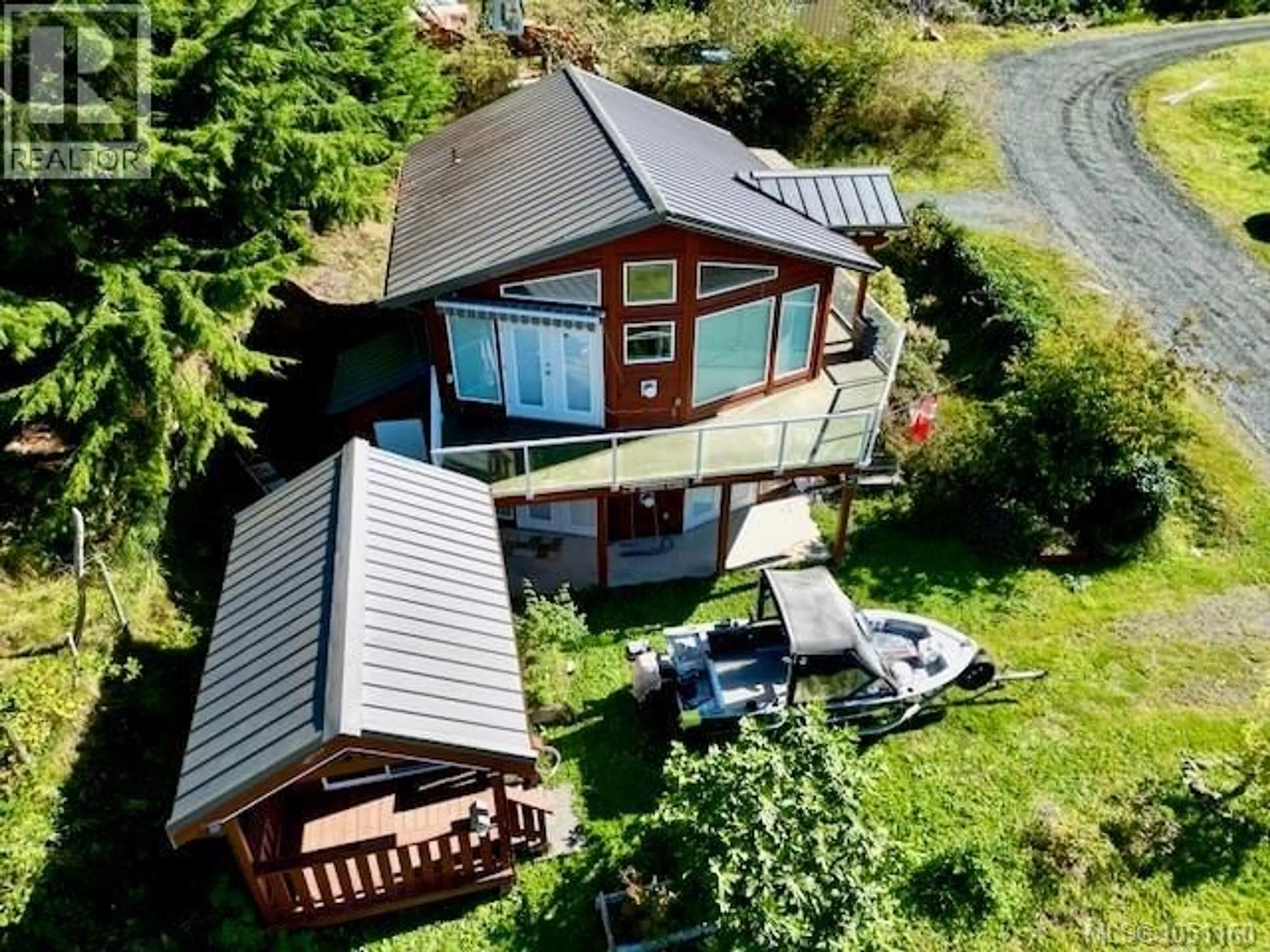 A pic from outside/outdoor area/front of a property/back of a property/a pic from drone, unknown for 8 COPPER CRESCENT, Port Alice British Columbia V0N2N0
