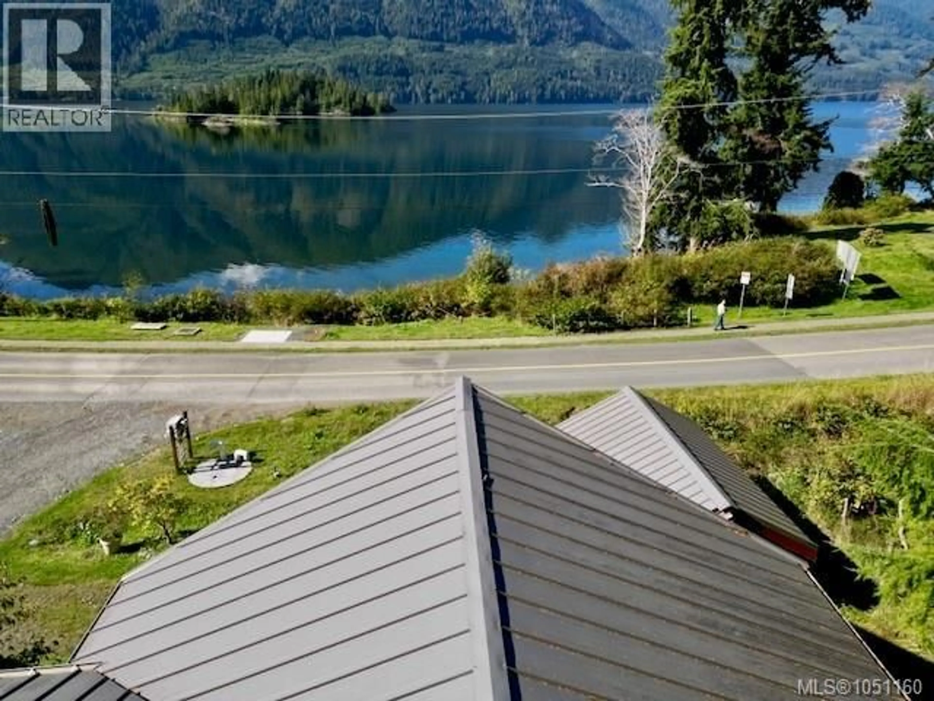 A pic from outside/outdoor area/front of a property/back of a property/a pic from drone, water/lake/river/ocean view for 8 COPPER CRESCENT, Port Alice British Columbia V0N2N0