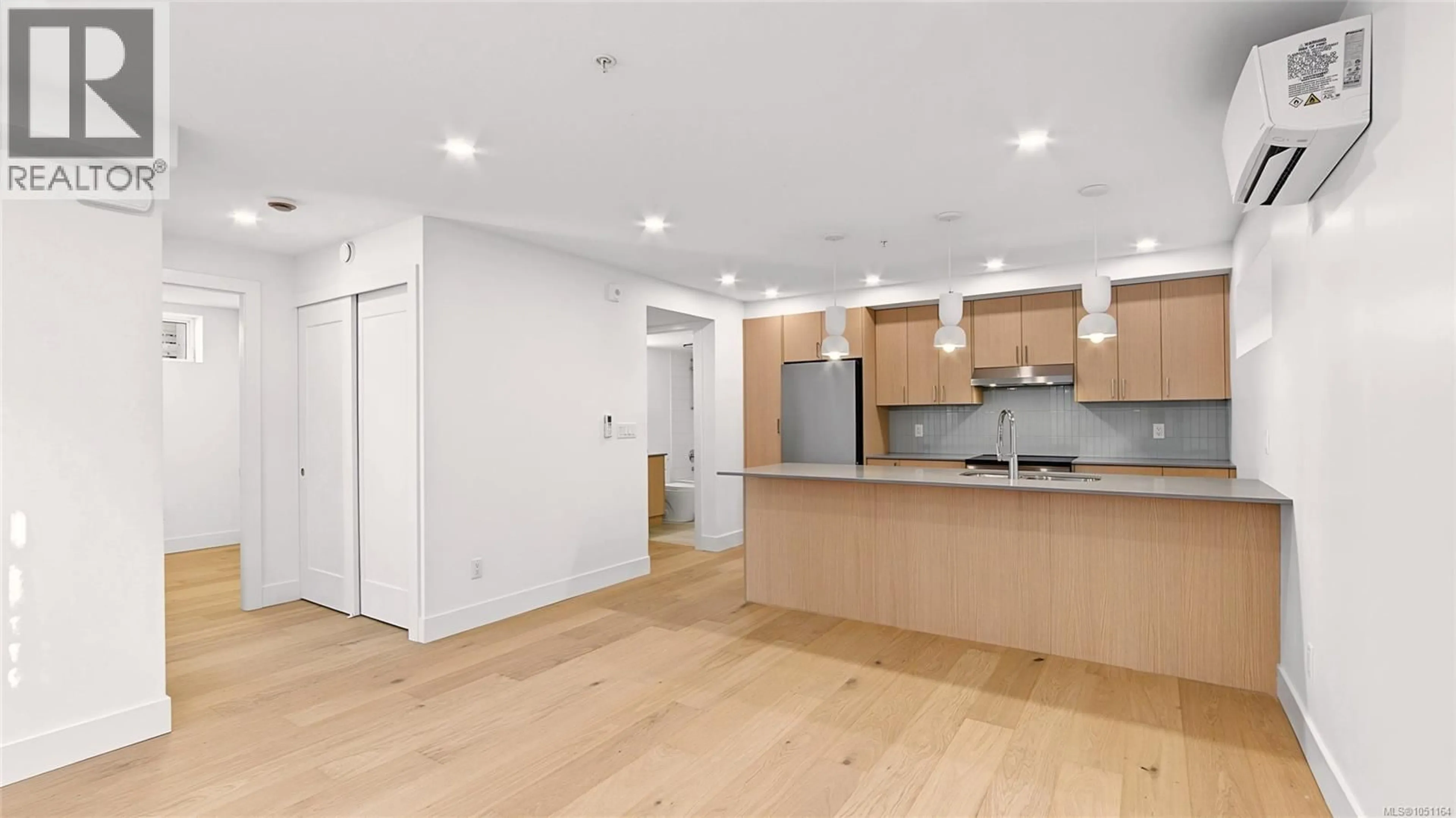 Open concept kitchen, wood/laminate floor for 3 - 1721 ADANAC STREET, Victoria British Columbia V8R2C4