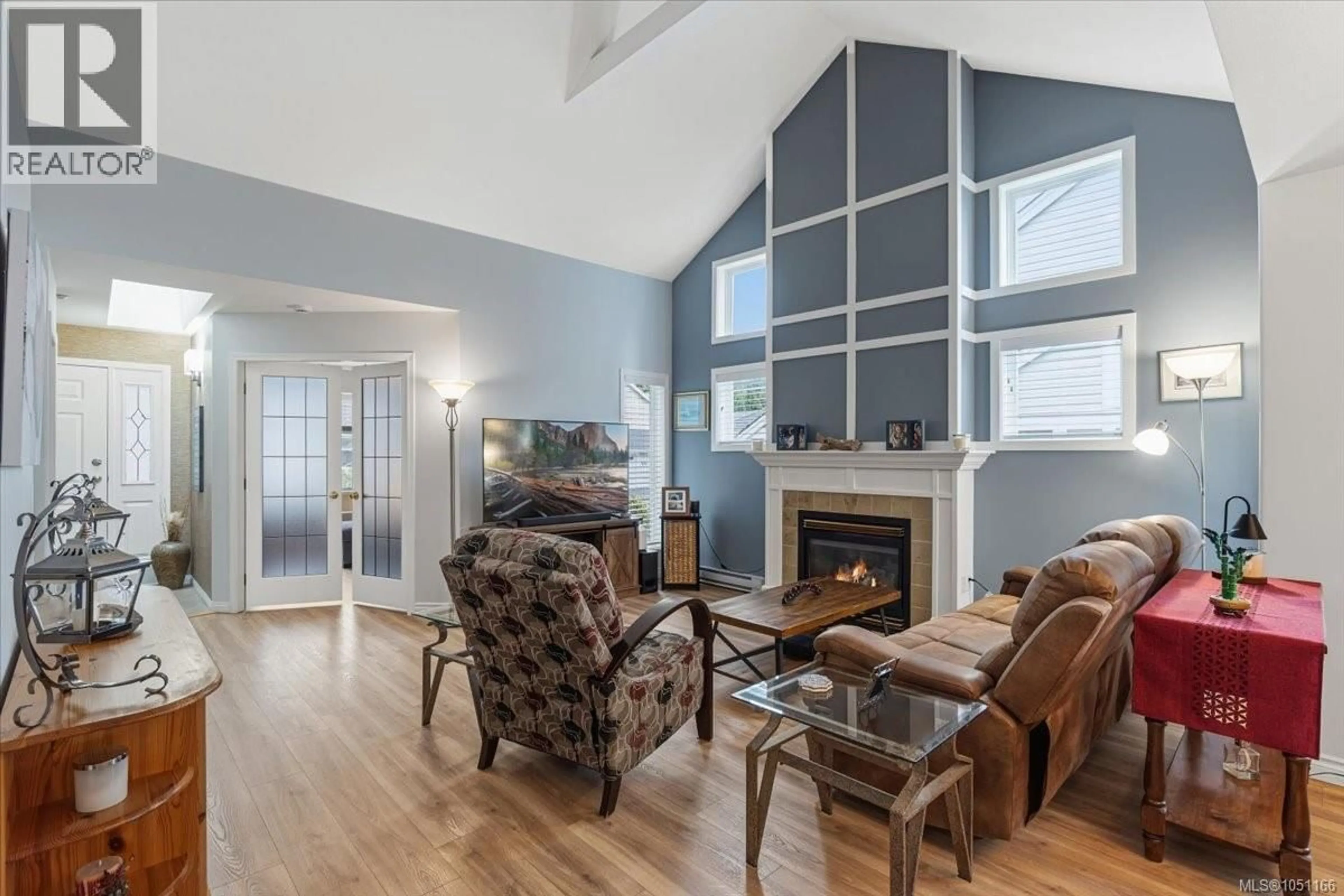 Living room with furniture, wood/laminate floor for 5267 ARBOUR CRESCENT, Nanaimo British Columbia V9T6E5