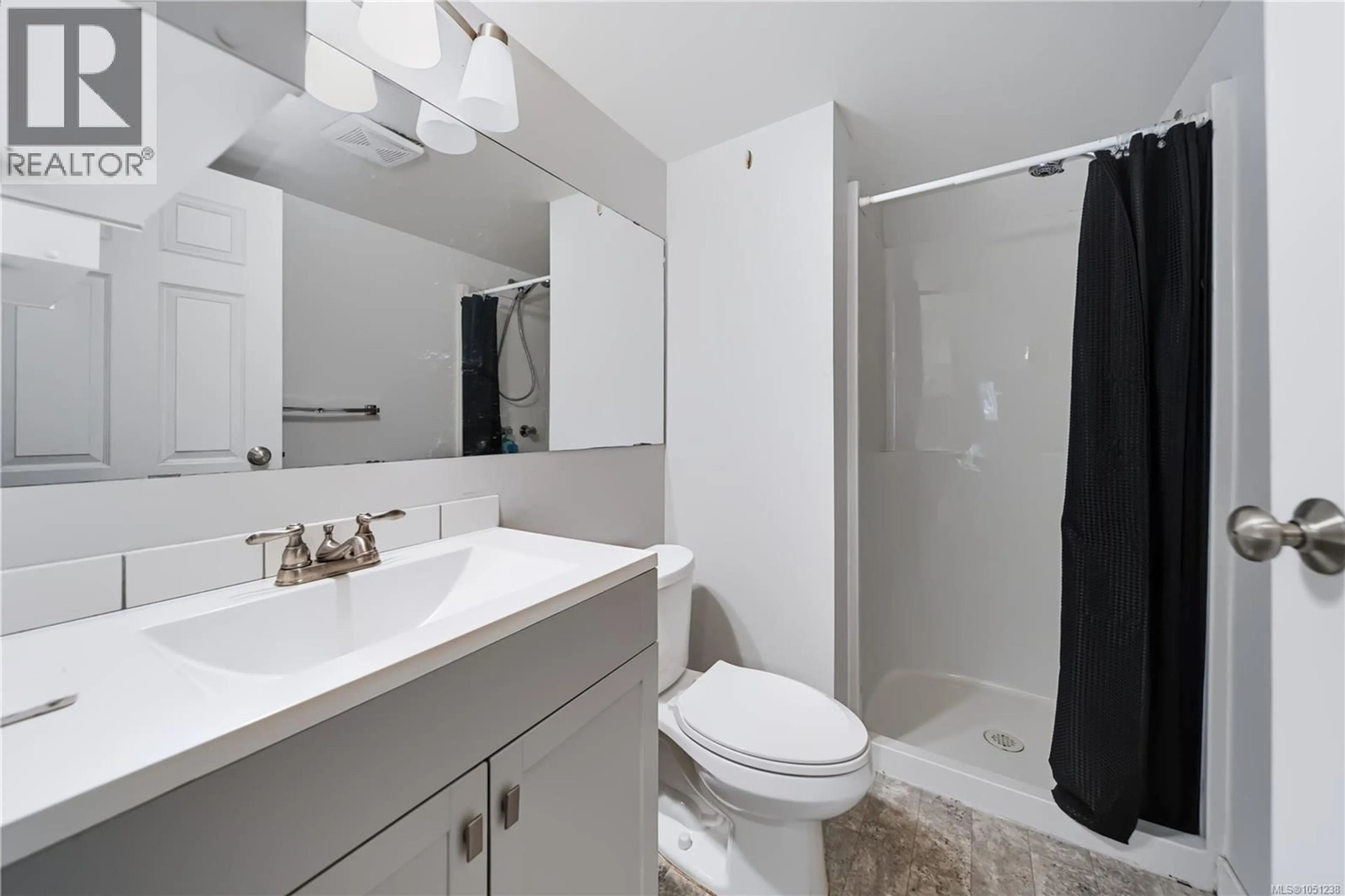 Standard bathroom, ceramic/tile floor for 101 - 6715 DOVER ROAD, Nanaimo British Columbia V9V1L8