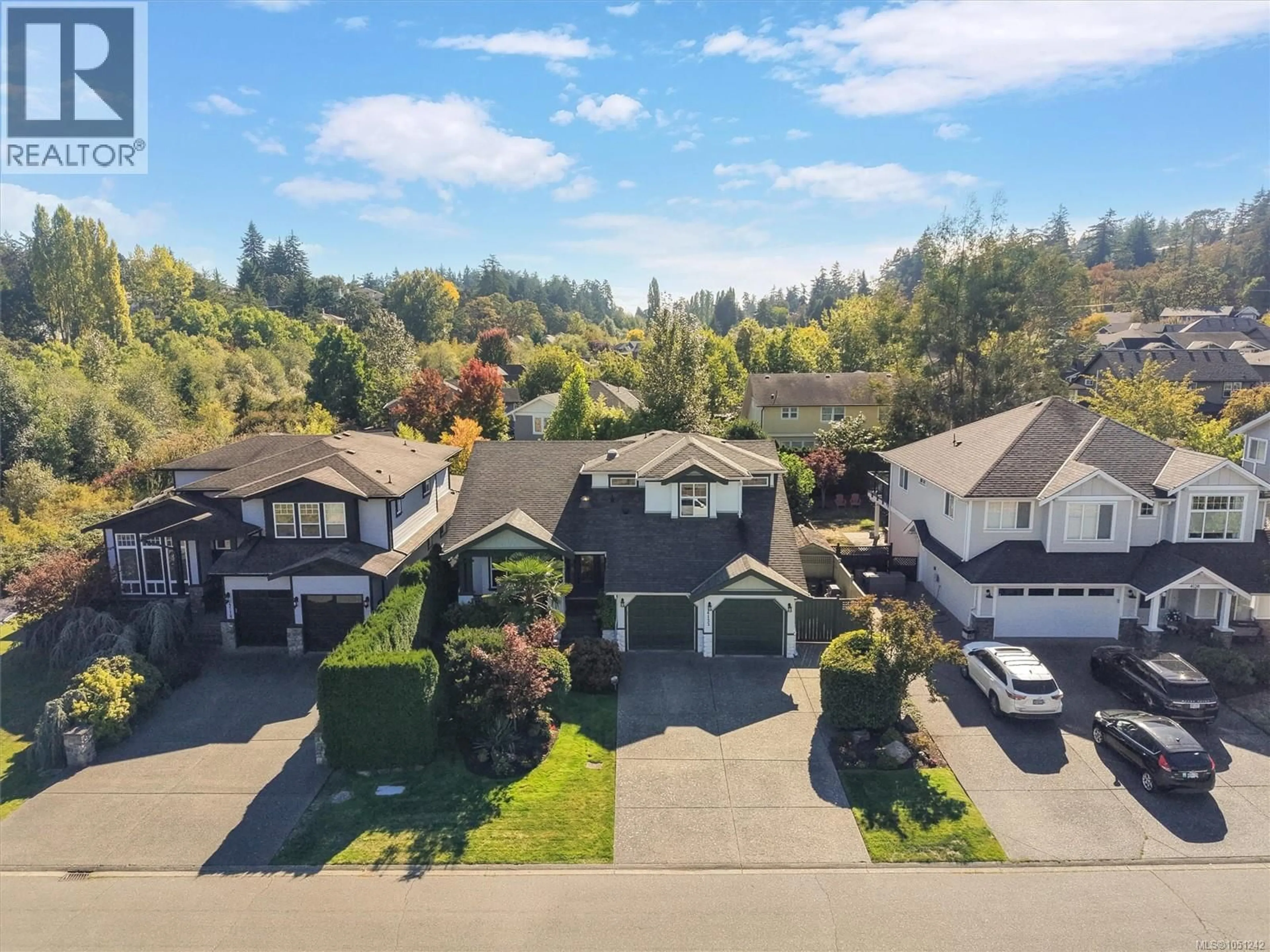 A pic from outside/outdoor area/front of a property/back of a property/a pic from drone, street for 4122 HATFIELD ROAD, Saanich British Columbia V8Z7H4