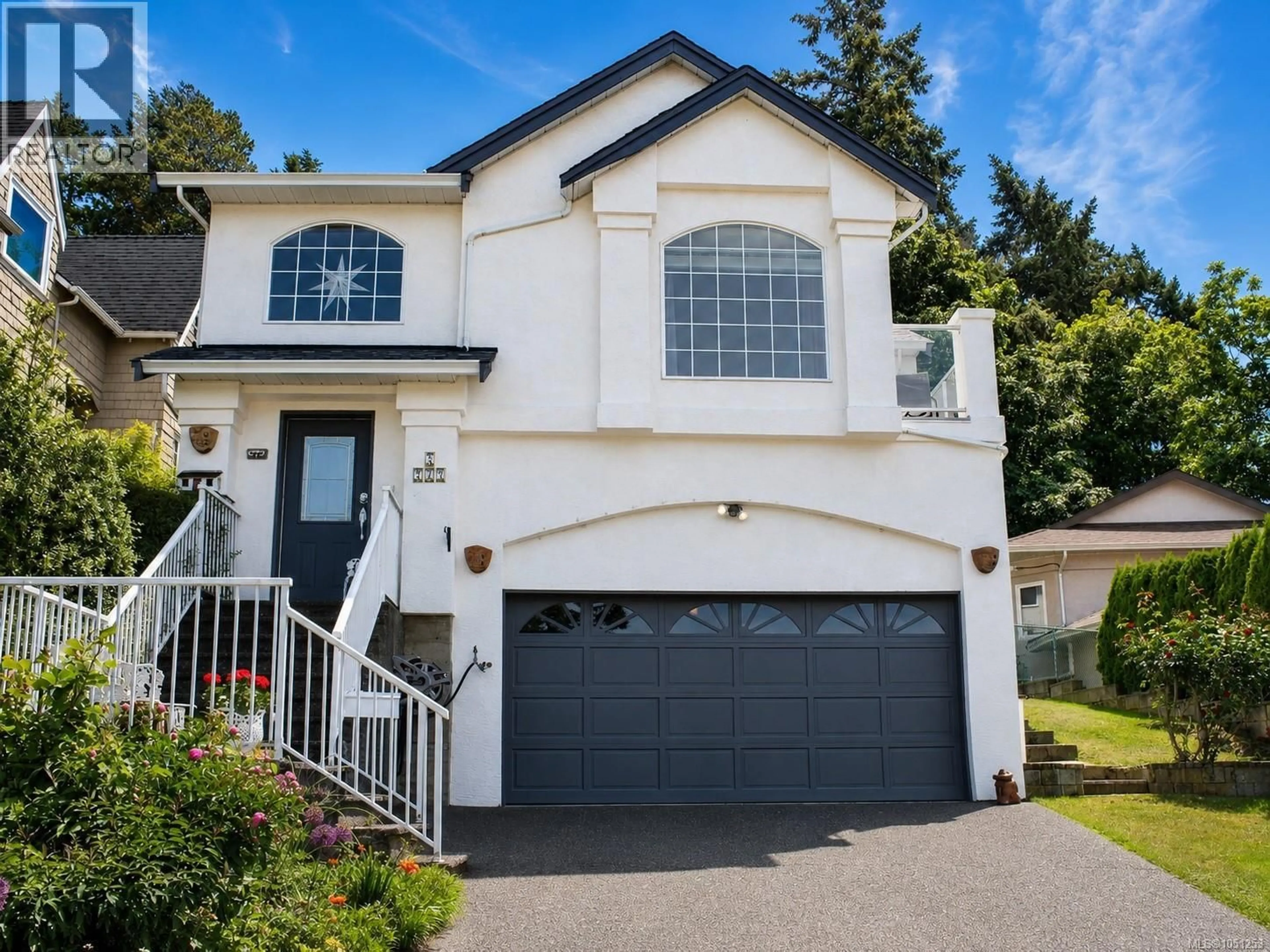 Home with vinyl exterior material, street for 2 - 709 LUSCOMBE PLACE, Esquimalt British Columbia V9A7L6