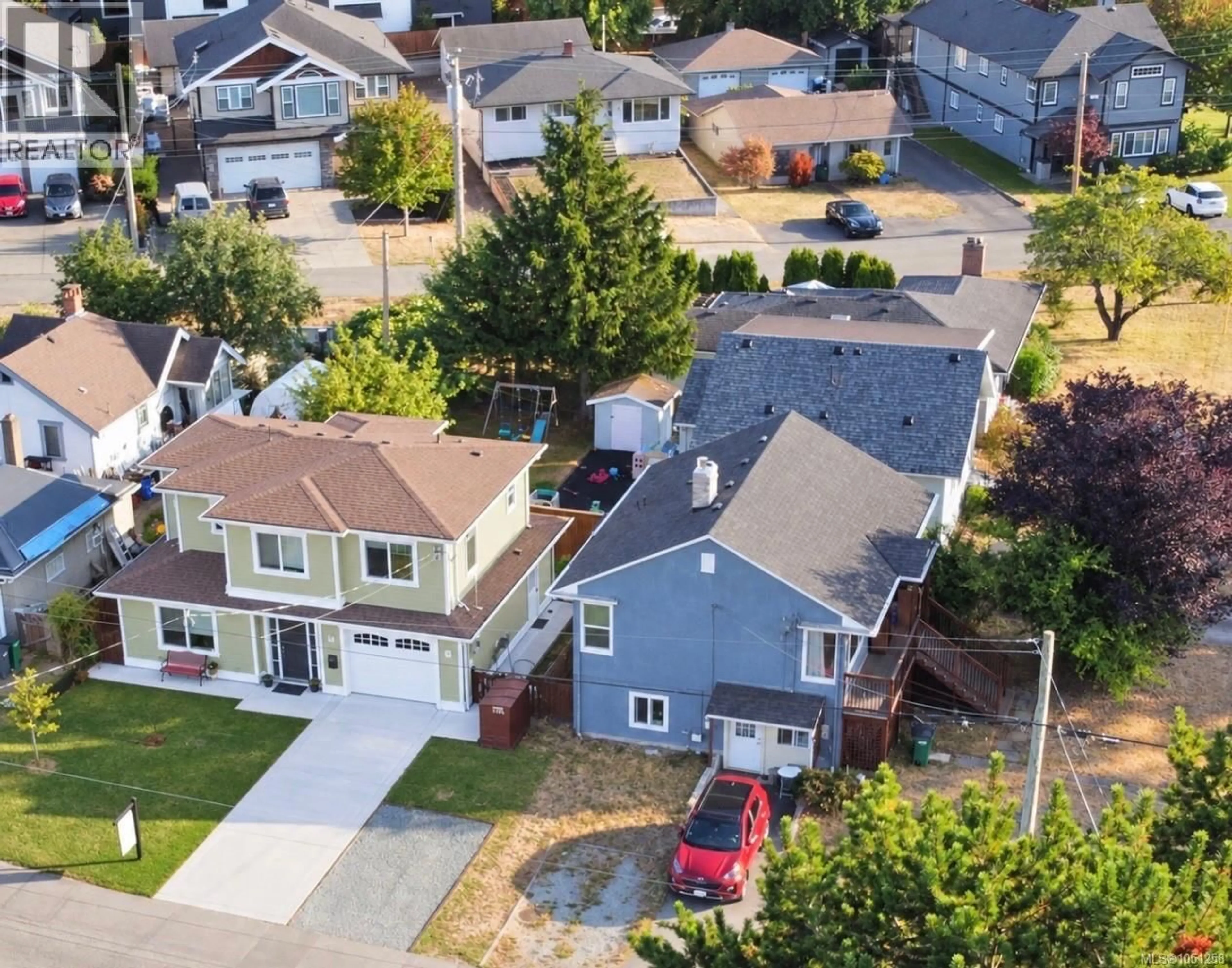 A pic from outside/outdoor area/front of a property/back of a property/a pic from drone, street for 57 SIMS AVENUE, Saanich British Columbia V8Z1J9