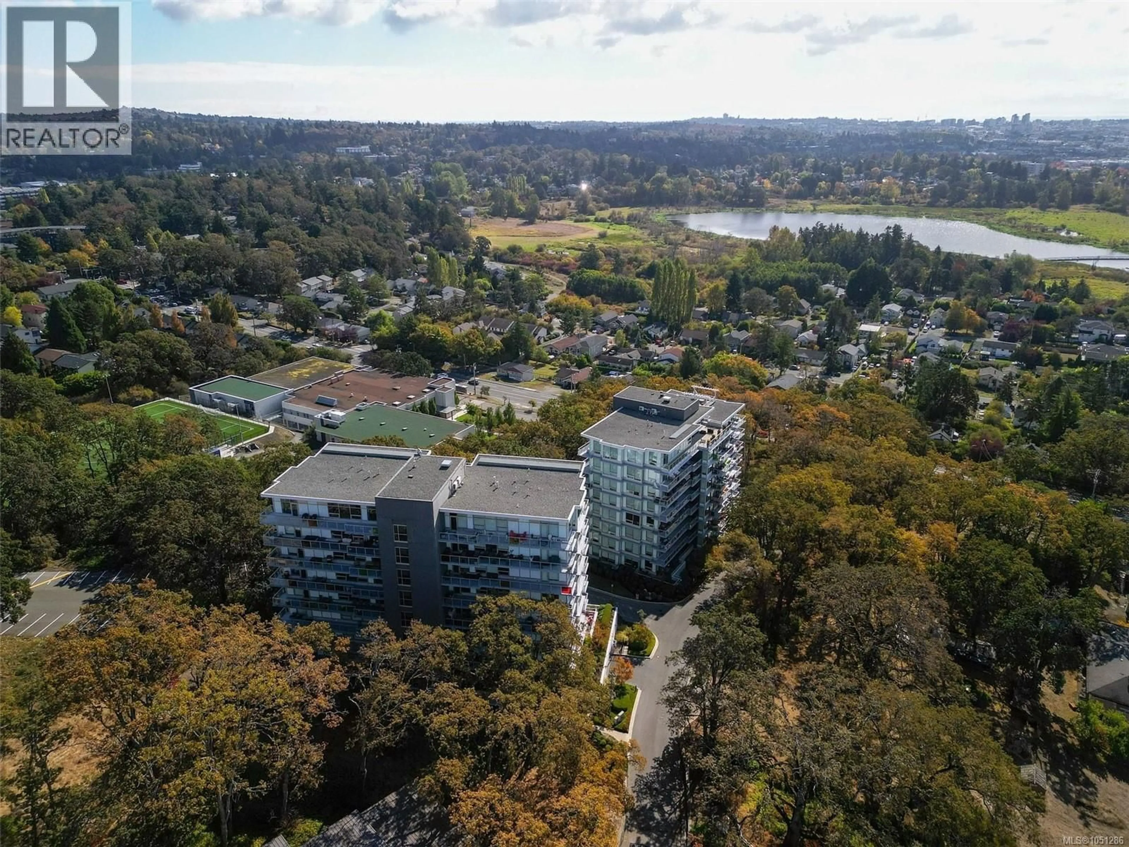 A pic from outside/outdoor area/front of a property/back of a property/a pic from drone, water/lake/river/ocean view for 703 - 4011 RAINBOW HILL LANE, Saanich British Columbia V8X0B6