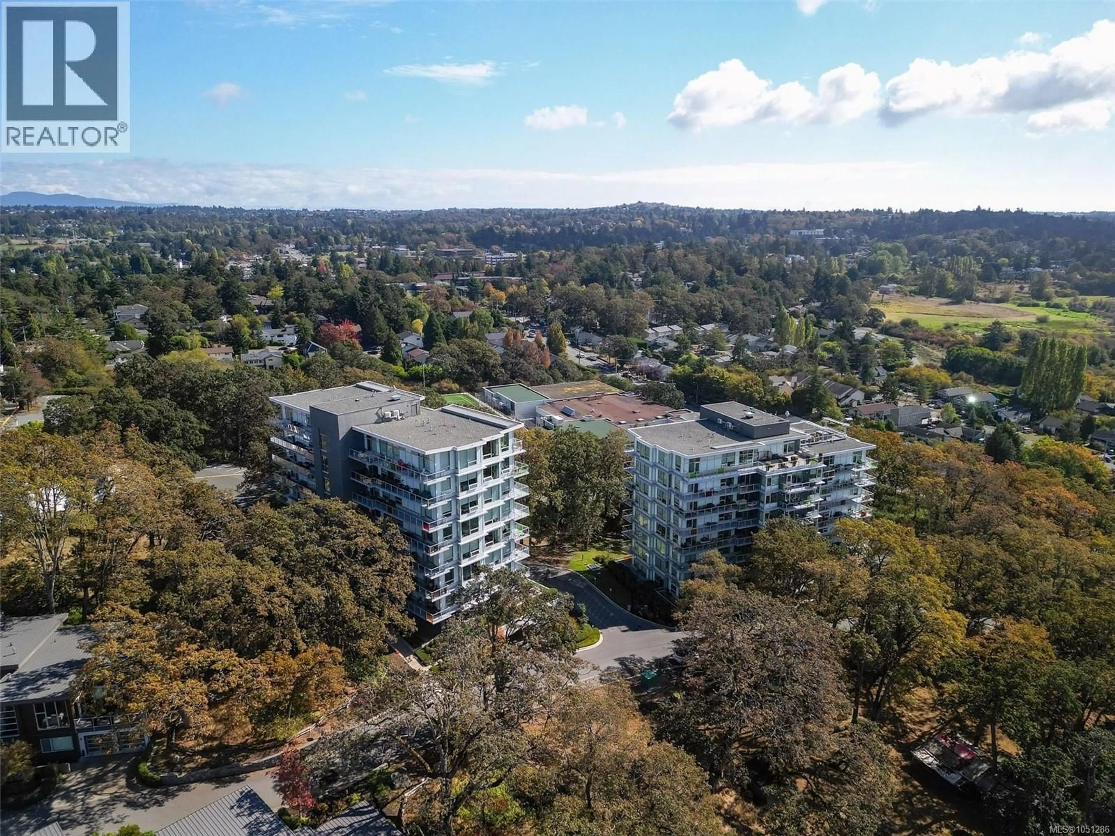 A pic from outside/outdoor area/front of a property/back of a property/a pic from drone, city buildings view from balcony for 703 - 4011 RAINBOW HILL LANE, Saanich British Columbia V8X0B6