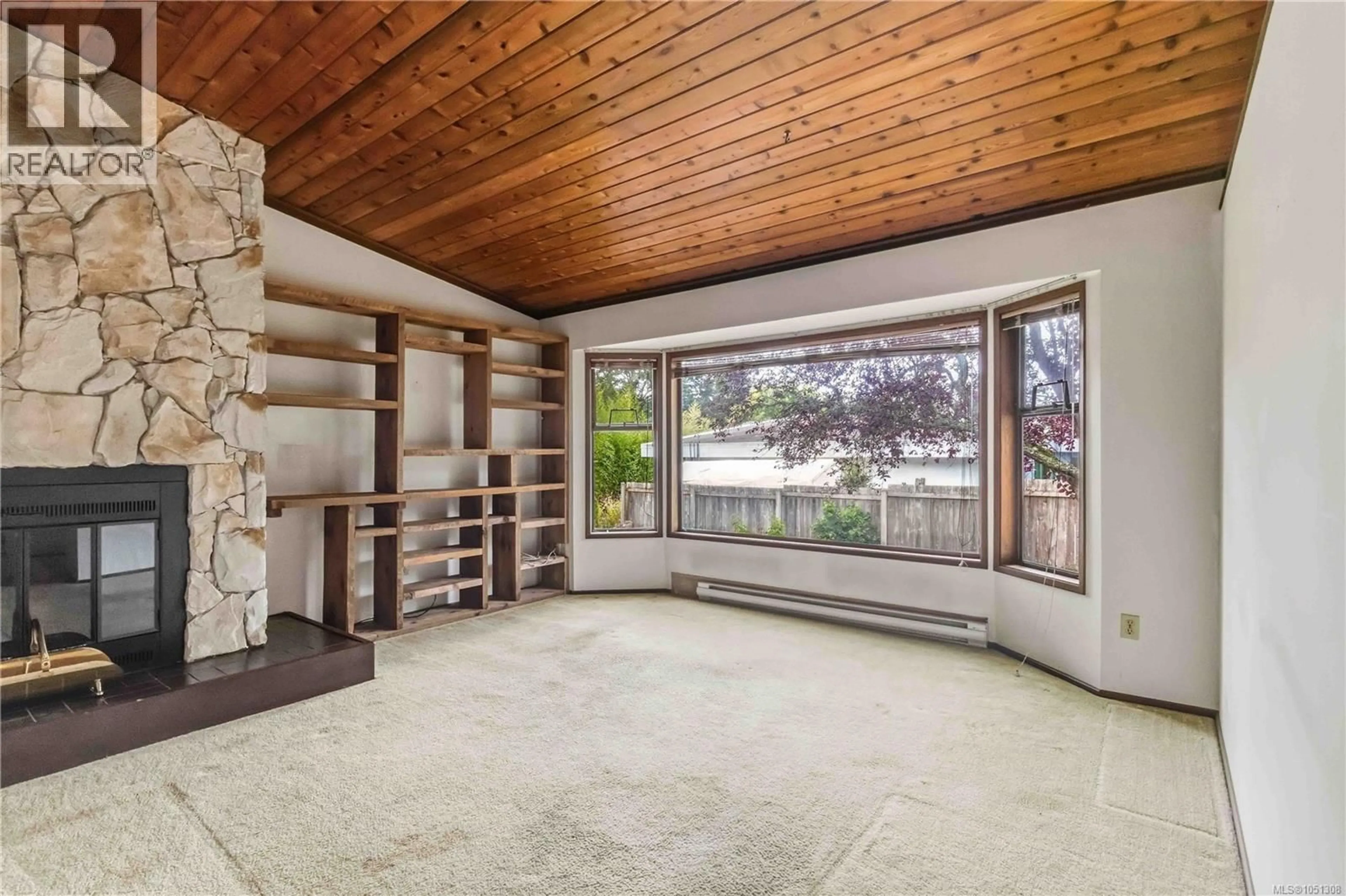 Living room with furniture, unknown for 946 PACONLA PLACE, Central Saanich British Columbia V8M1E1