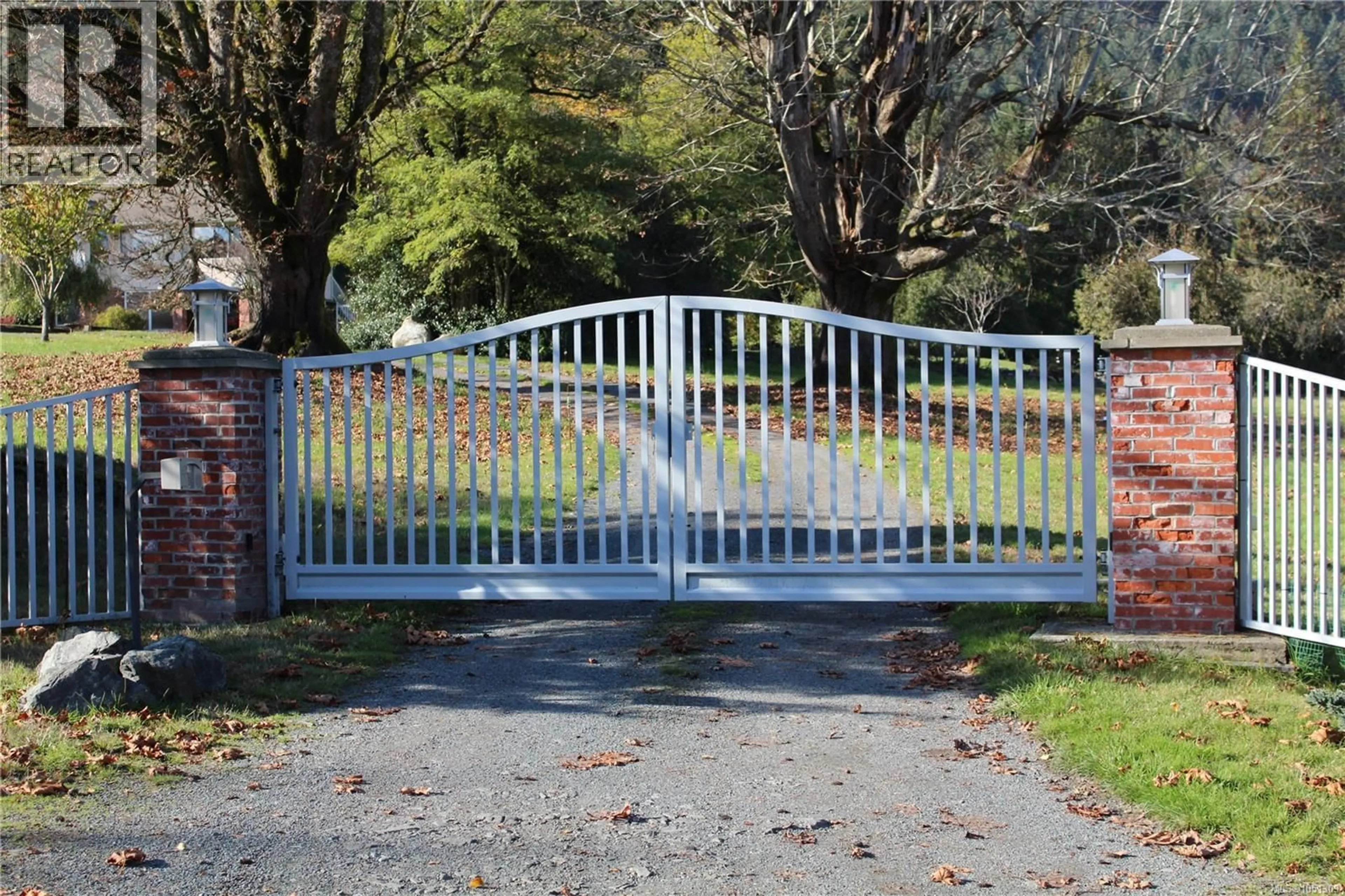 A pic from outside/outdoor area/front of a property/back of a property/a pic from drone, street for 7028 WESTHOLME ROAD, Westholme British Columbia V9L6B4